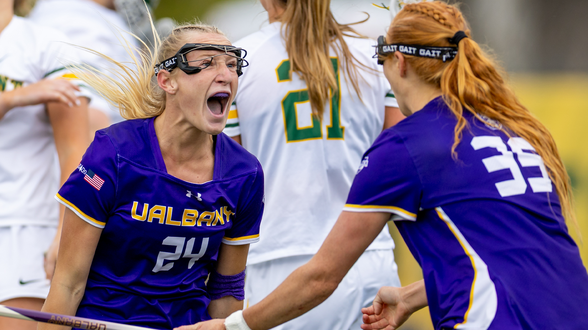 Kloey Roos and Ravan Marsell after a goal scored by Roos in the America East Championship game vs No.1 Seed Vermont