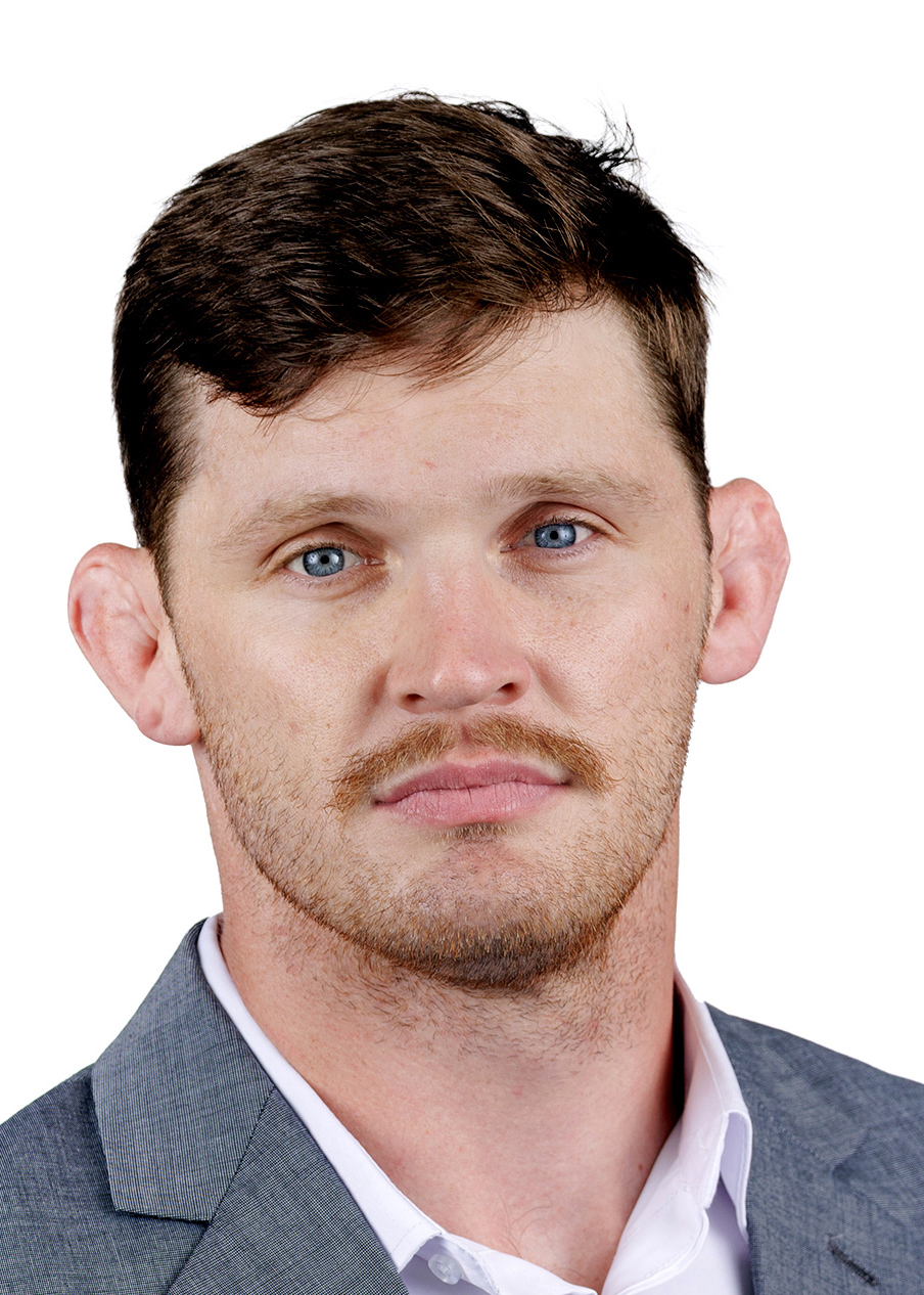 Athletics headshot of Austin Schafer, assistant  wrestling coach 
Photo by Benjamin Krain