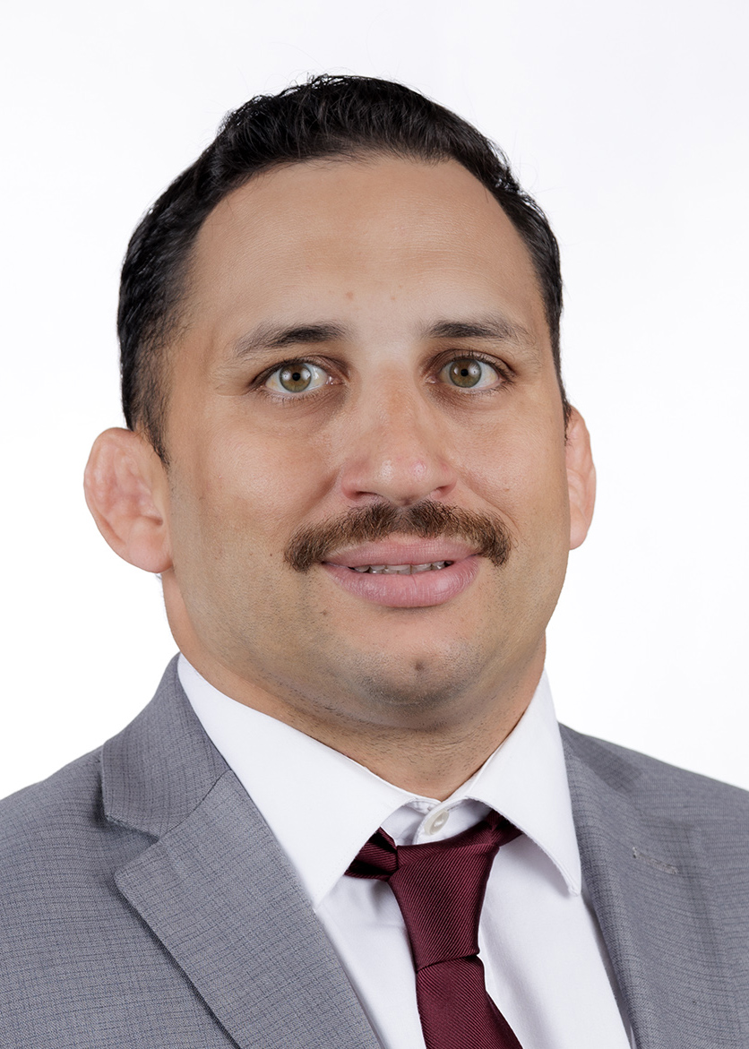 Athletics headshot of Javier Maldonado, assistant  wrestling coach 
Photo by Benjamin Krain