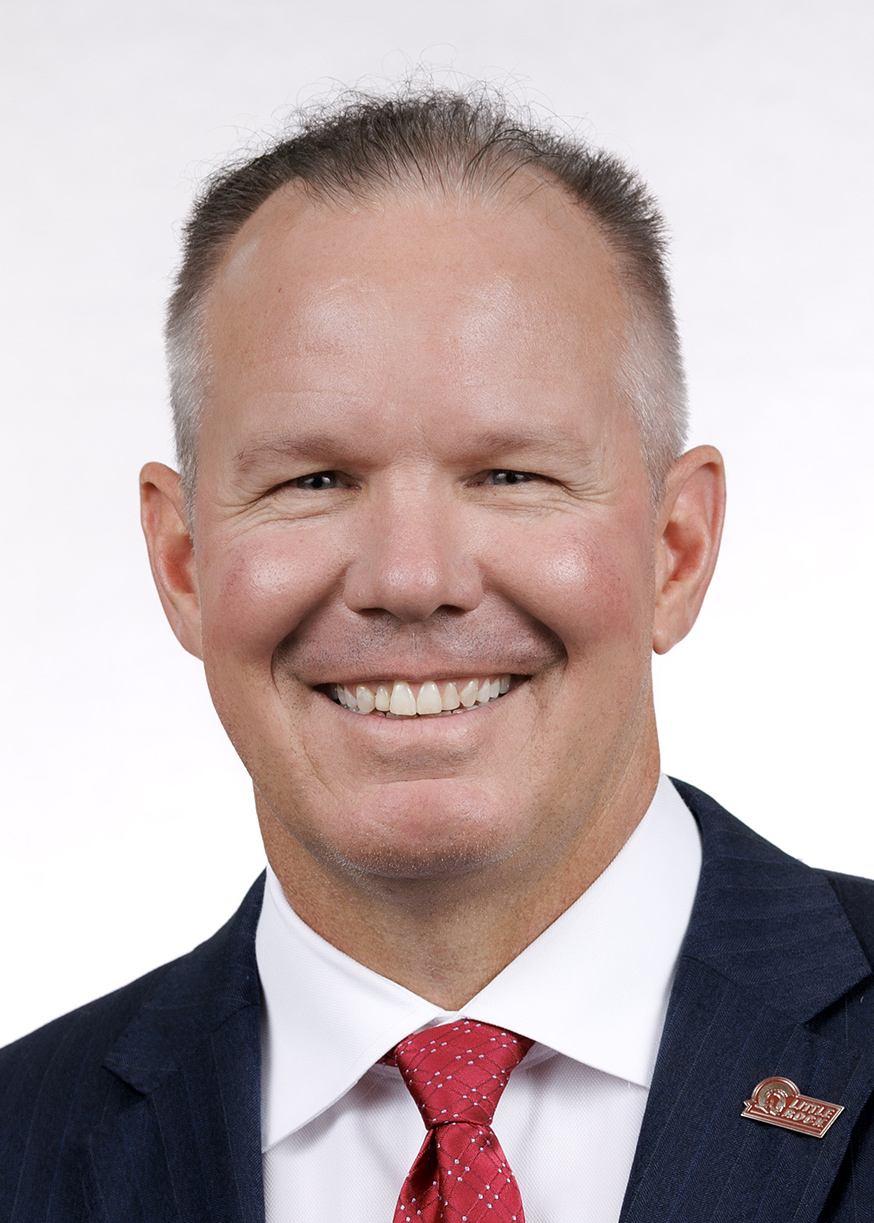 Athletics staff headshot of baseball coach Chris Curry
Photo by Benjamin Krain
