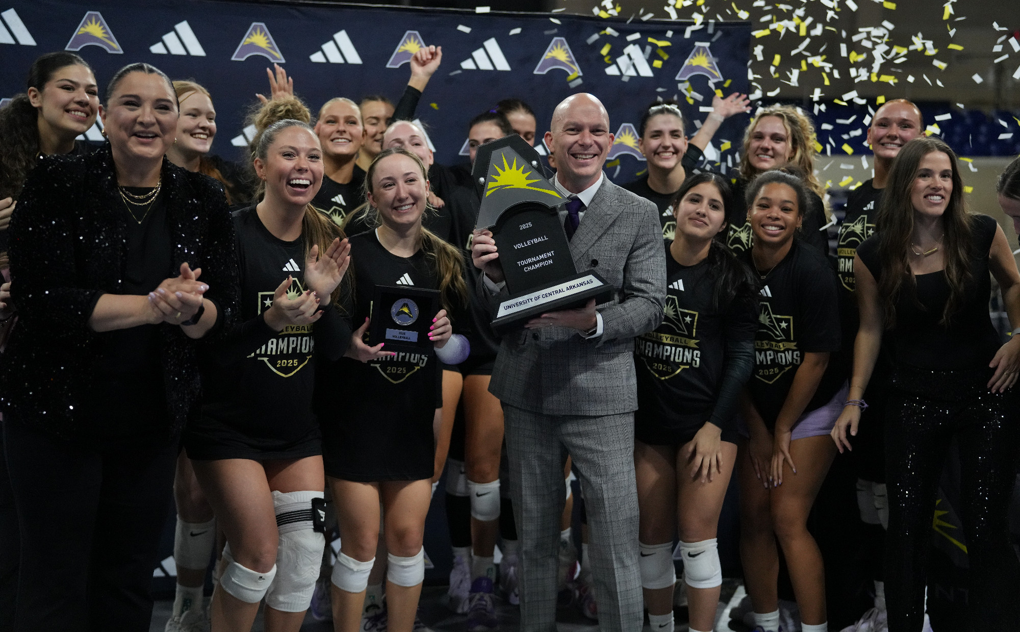Volleyball with ASUN trophy