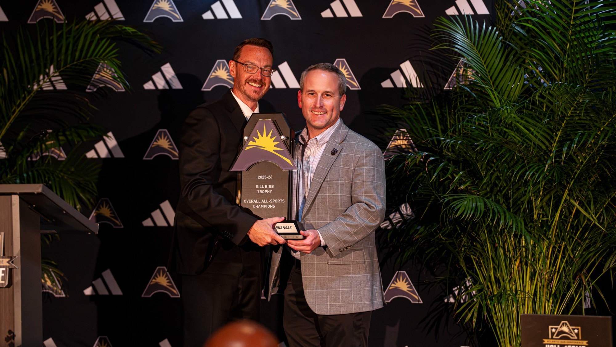Whiting receiving ASUN trophy