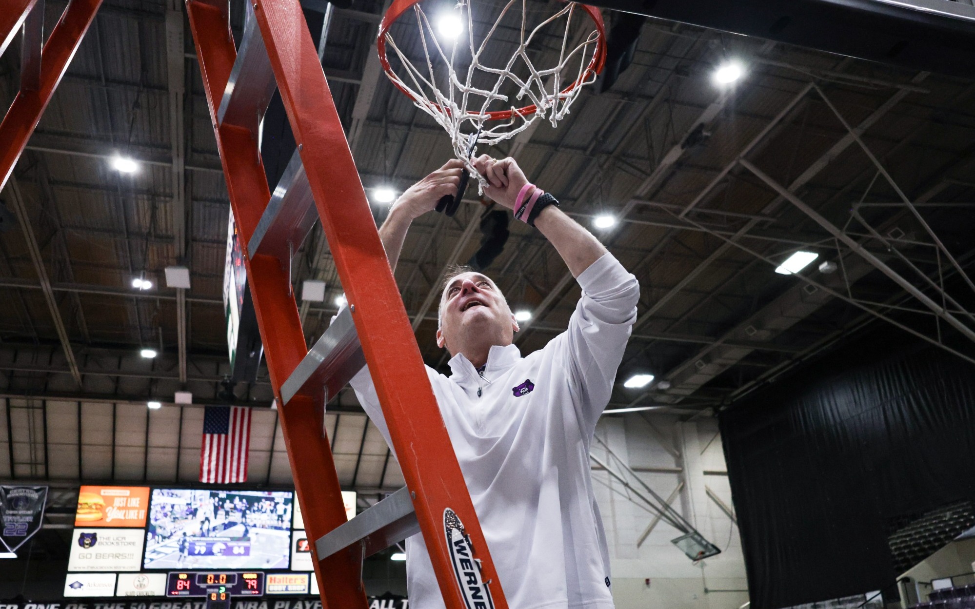Shulman cutting down the net
