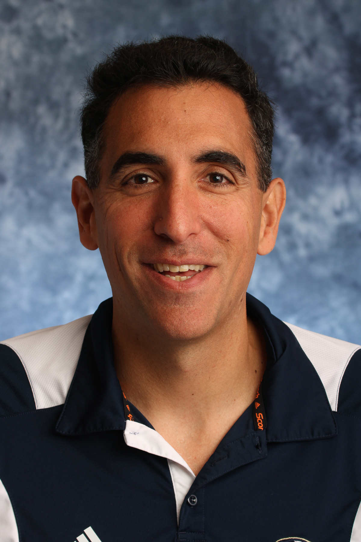 Volunteer assistant coach Larry Bercutt 2013 women's water polo head sho