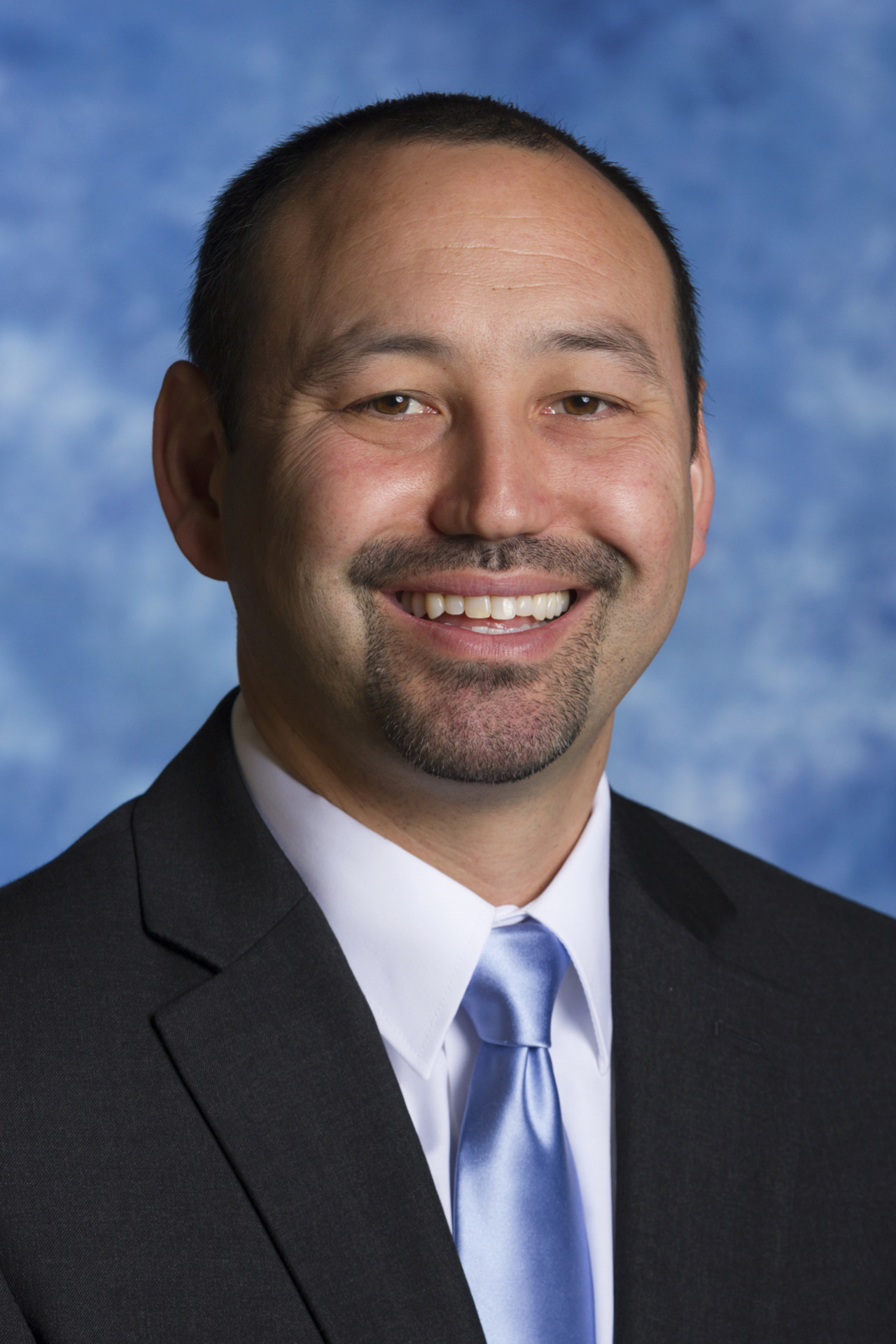 Assistant coach Joe Teramoto 2014-15 women's basketball head shot. Oct. 23, 2014. Photo by Mark Honbo