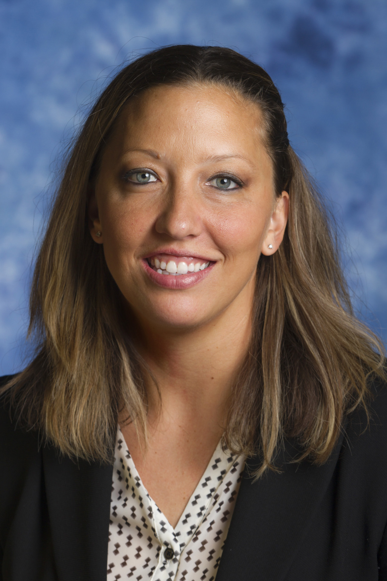 Assistant coach Des Abeyta 2014-15 women's basketball head shot. Oct. 23, 2014. Photo by Mark Honbo