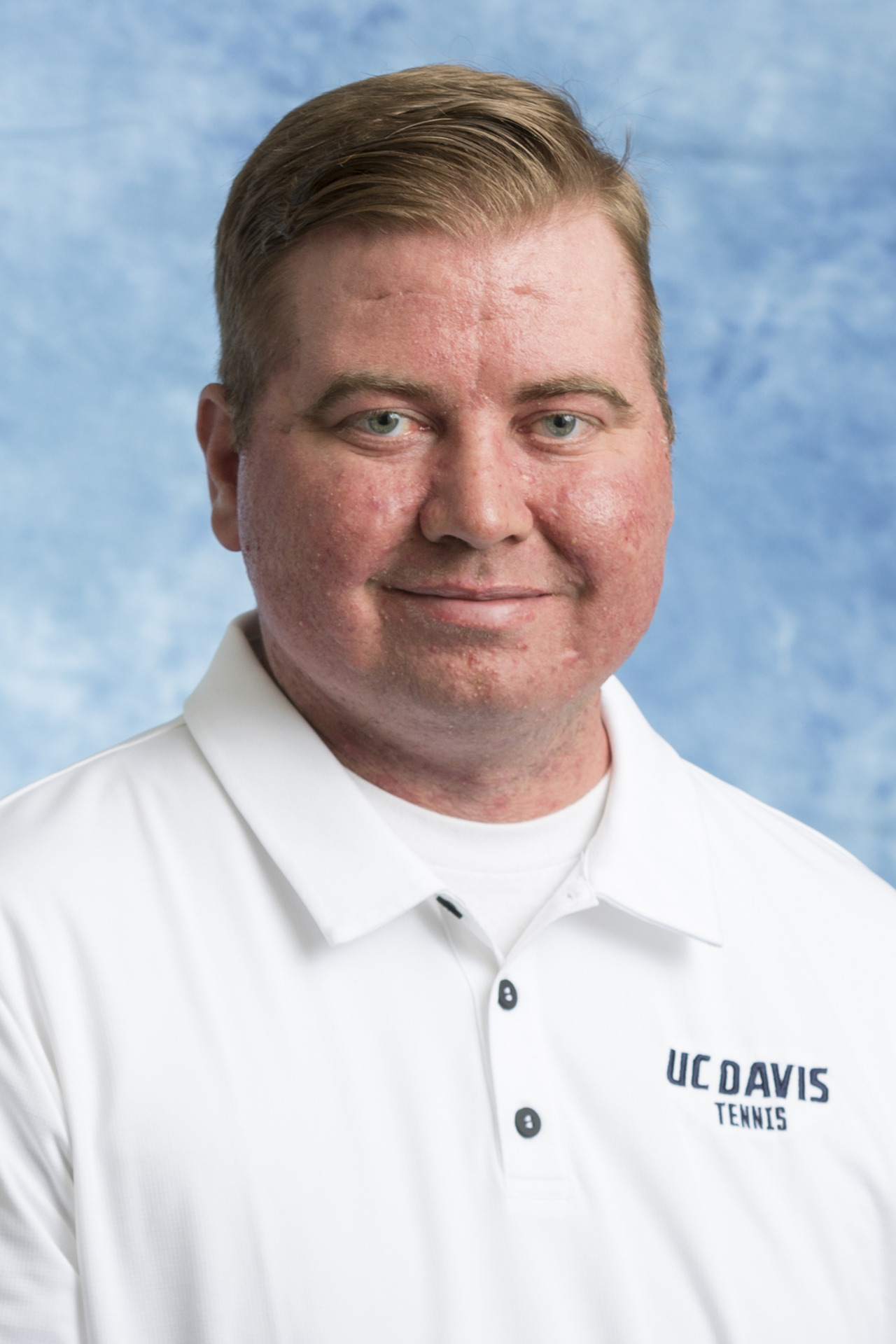 Assistant coach Nathan Robinson 2017-18 men's tennis head shot. Oct. 3, 2017. Photo by Mark Honbo