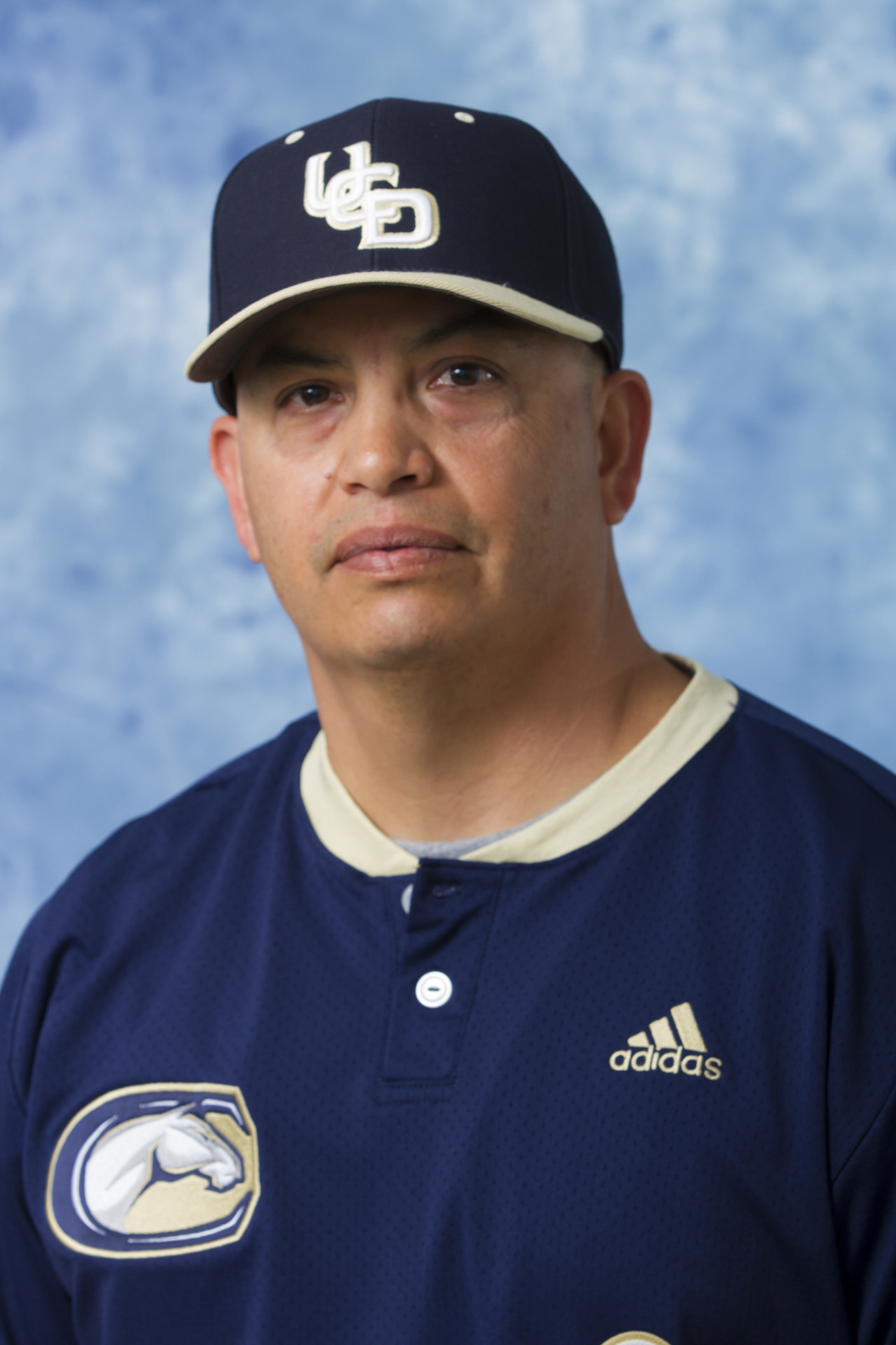 Assistant coach Lloyd Acosta (2) baseball head shot. Feb. 13, 2017. Photo by Mark Honbo