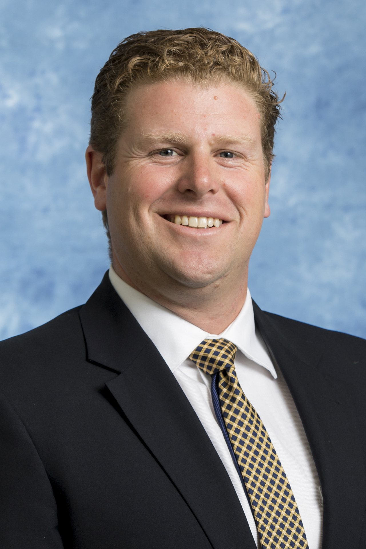 Assistant coach Trent Calder 2018 portrait. Photo by Mark Honbo.
