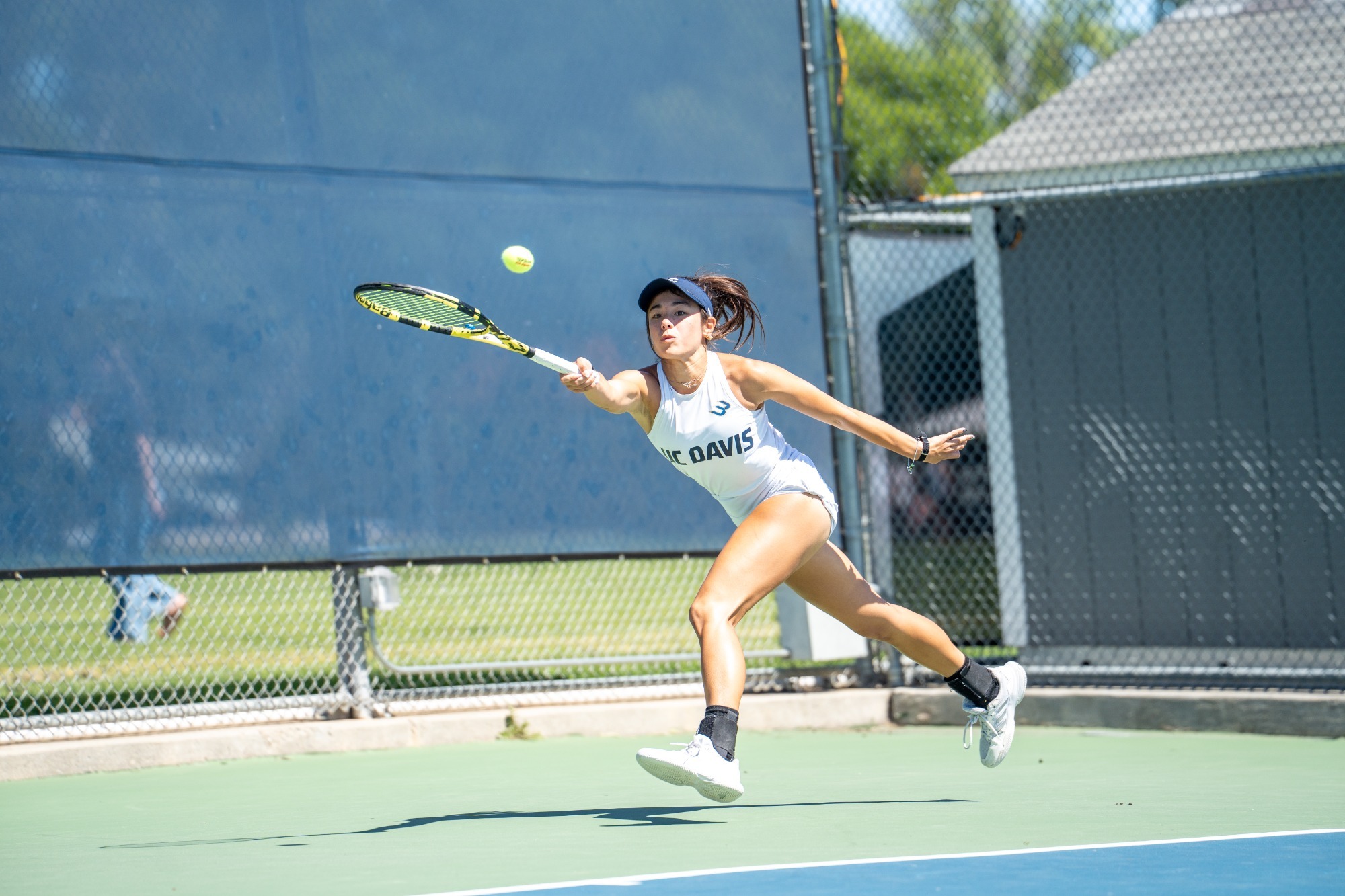 Women's Tennis player in the middle of a rally