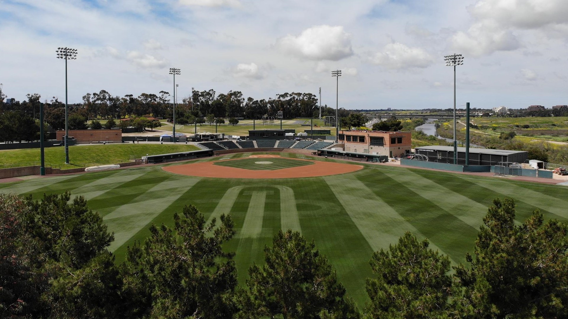 anteater-ballpark-uci-bsb-2021-cicerone-field-facilities-home-plate-stands-sky-weather