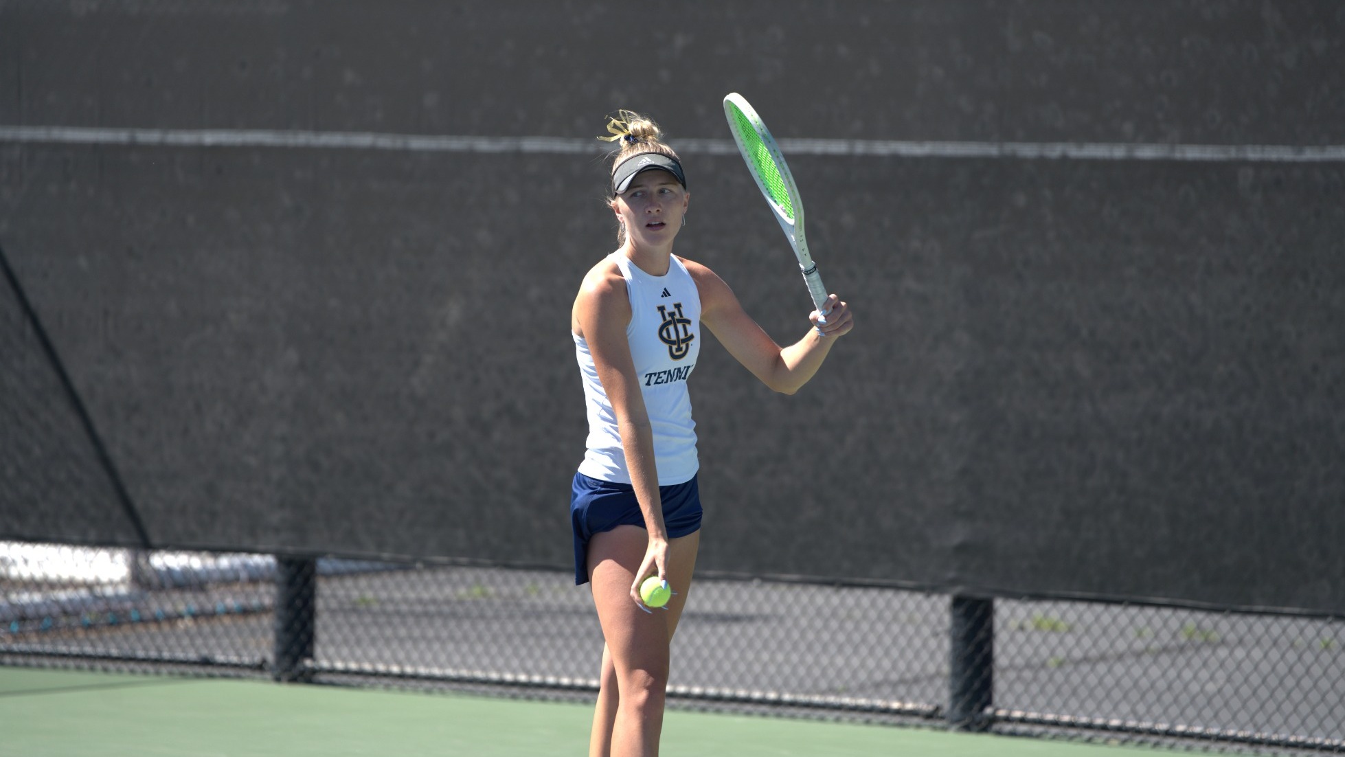 Lyna readies to serve