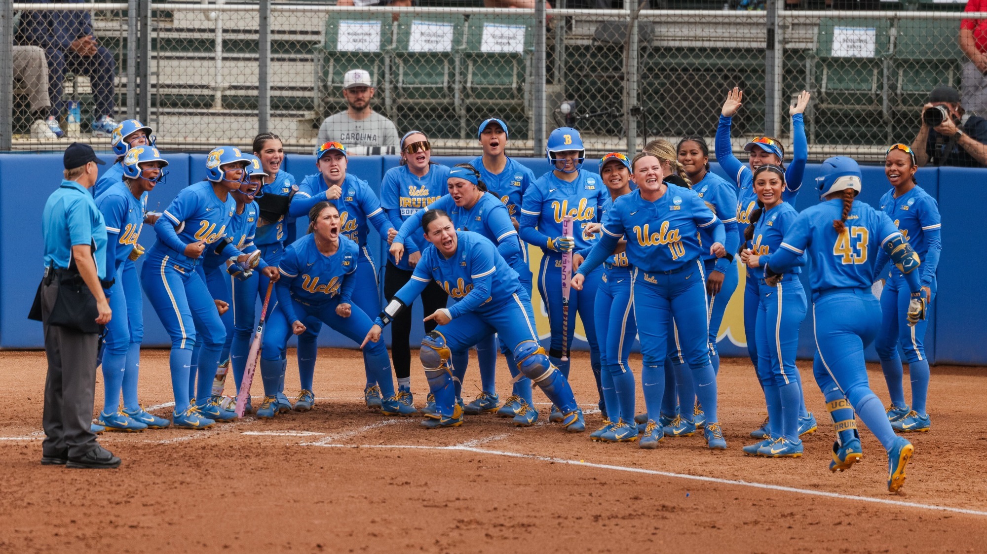 UCLA's Megan Grant celebrates her 40th home run, a grand slam against South Carolina