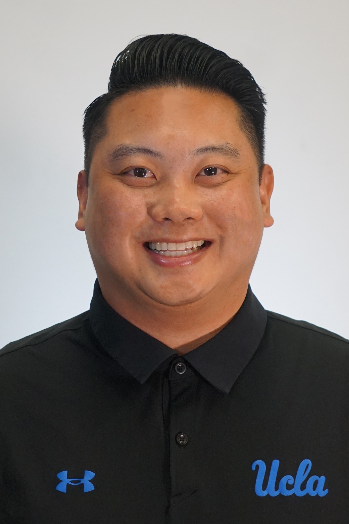 Osciar Rinon Comp Sports Staff Headshot