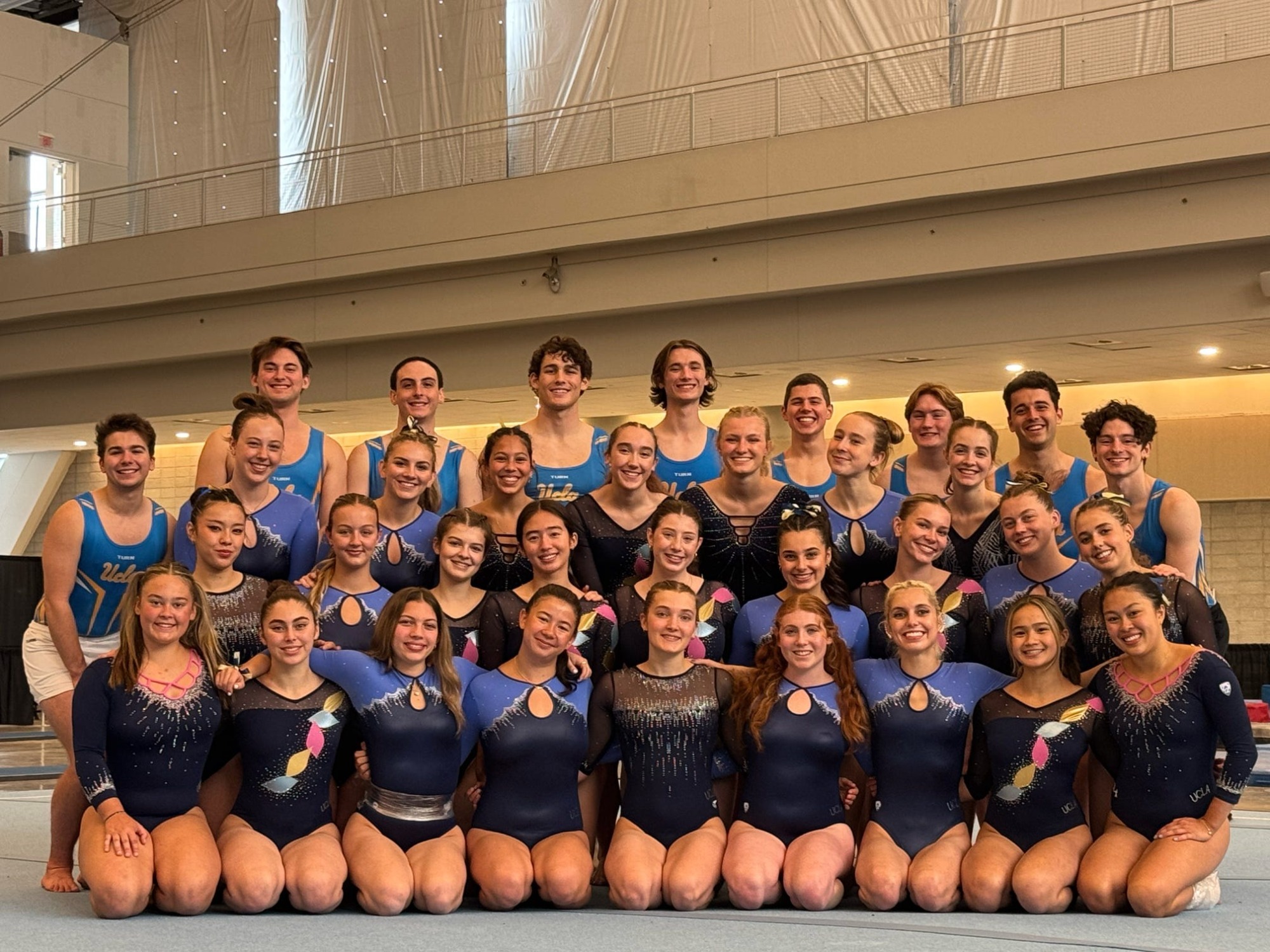 Members of UCLA Club Gymnastics pose for a team picture following the competition.