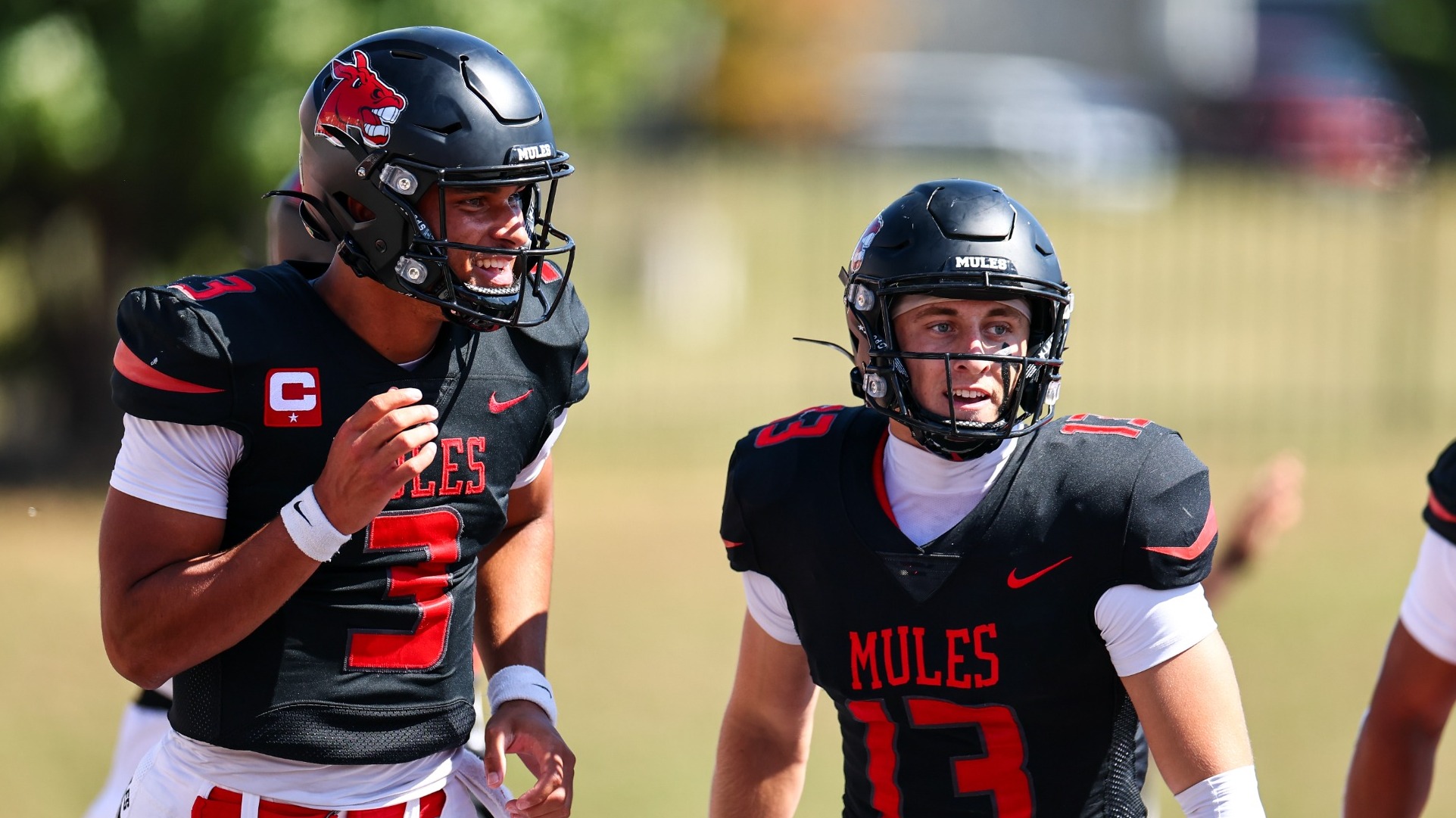 UCM Mules quarterback Donovyn Omolo (3) and wide receiver Jake Weber (13) during a MIAA college football game against the Missouri Southern State University (MSSU) Lions at Walton Stadium/Kennedy Field on September 27, 2025 in Warrensburg, Missouri.