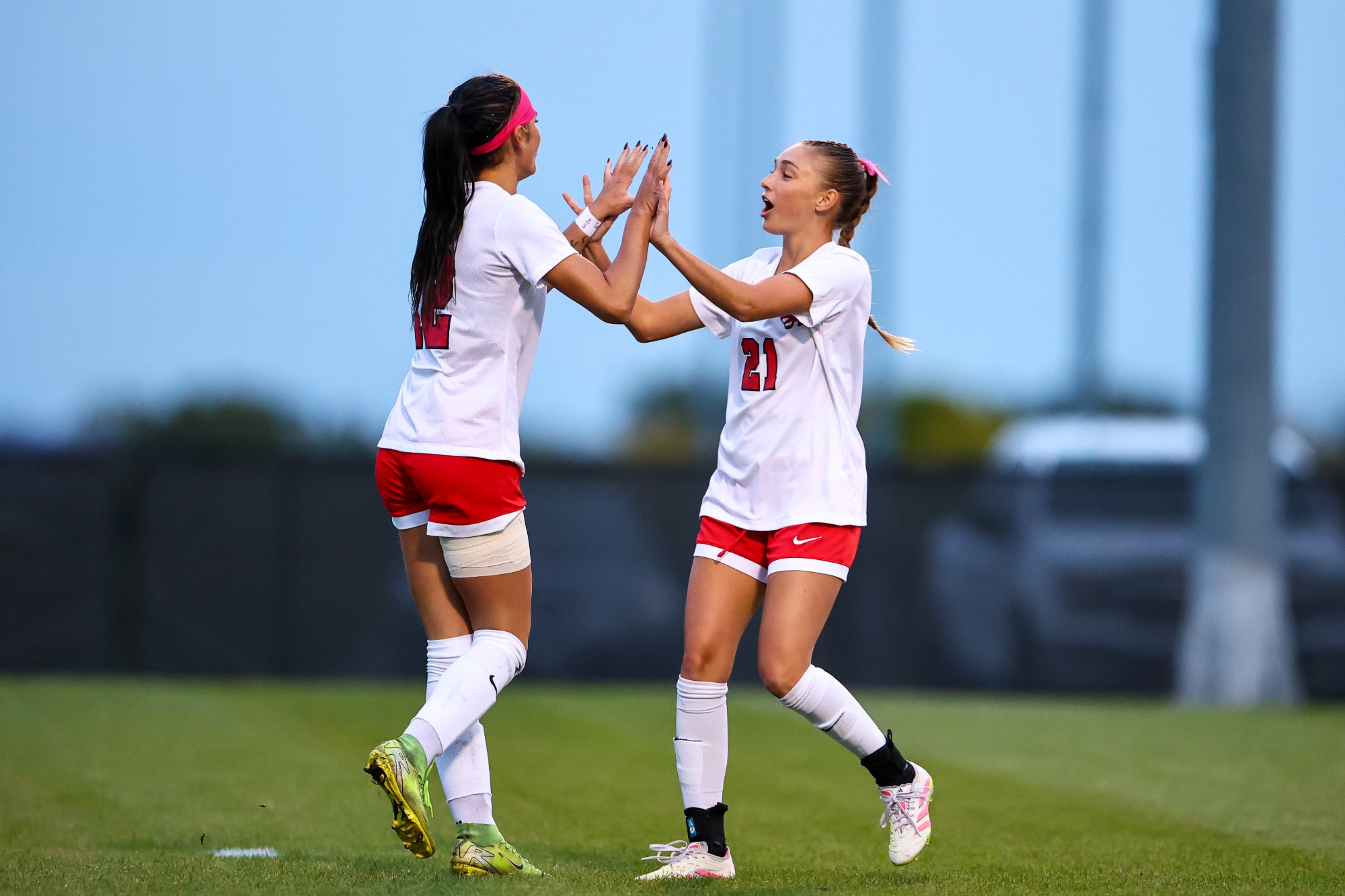 UCM Jennies forward Mikayla Ernst (12) and midfielder Coryn Jespersen (21) during a MIAA college soccer game against the Missouri Southern State University (MSSU) Lions  on the Jennies Soccer Field at the UCM South Recreation Complex in Warrensburg, Missouri on October 31, 2025.
