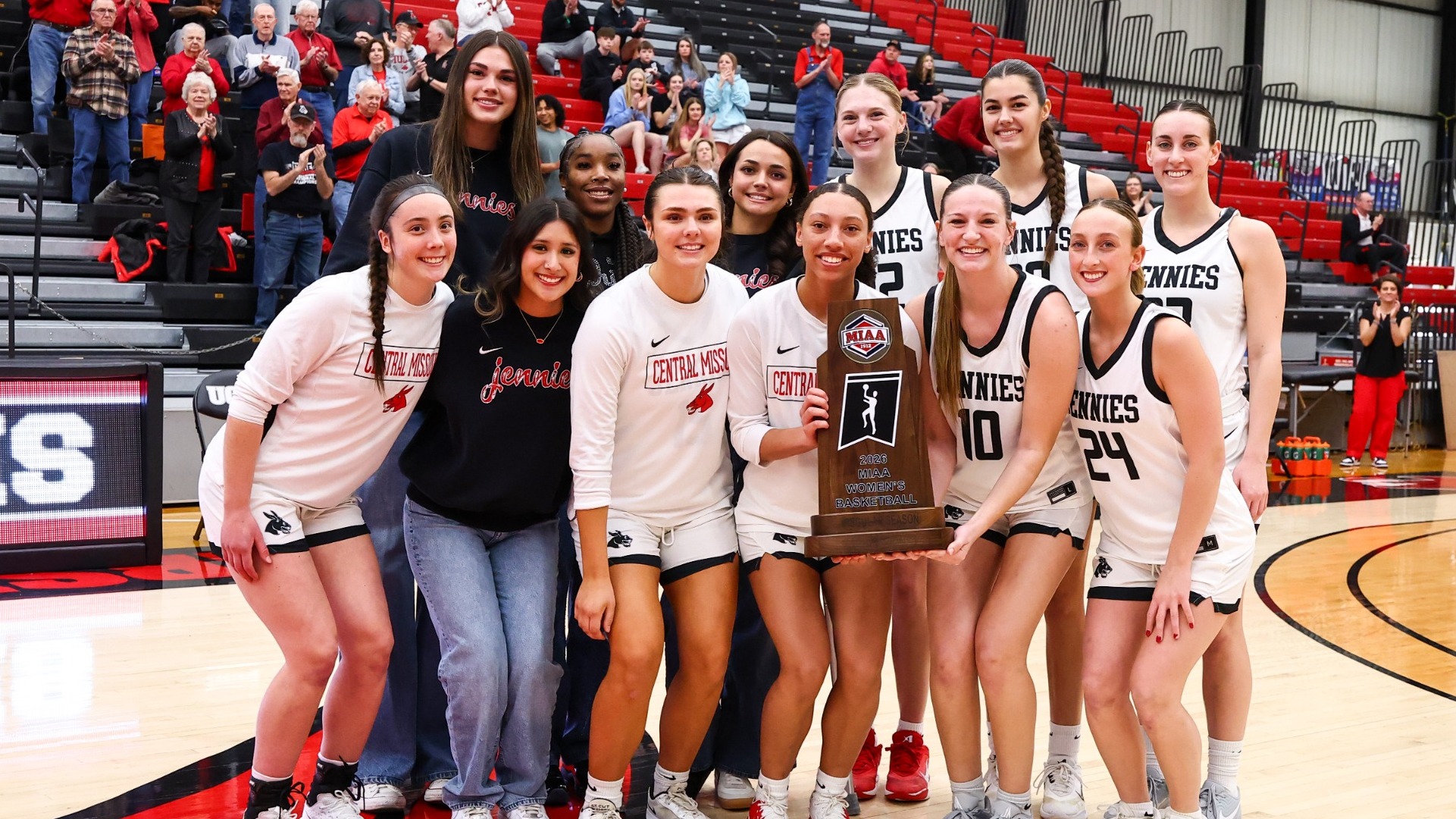 Jennies Basketball with MIAA Regular Season Trophy 2026