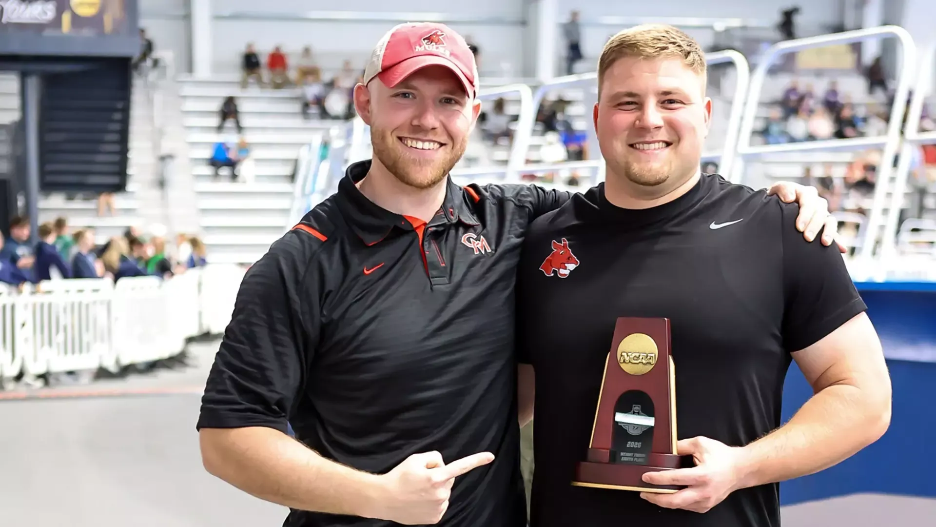 Throws Coach Brent Fairbanks and Landon Mason at the NCAA-II Indoor Championships