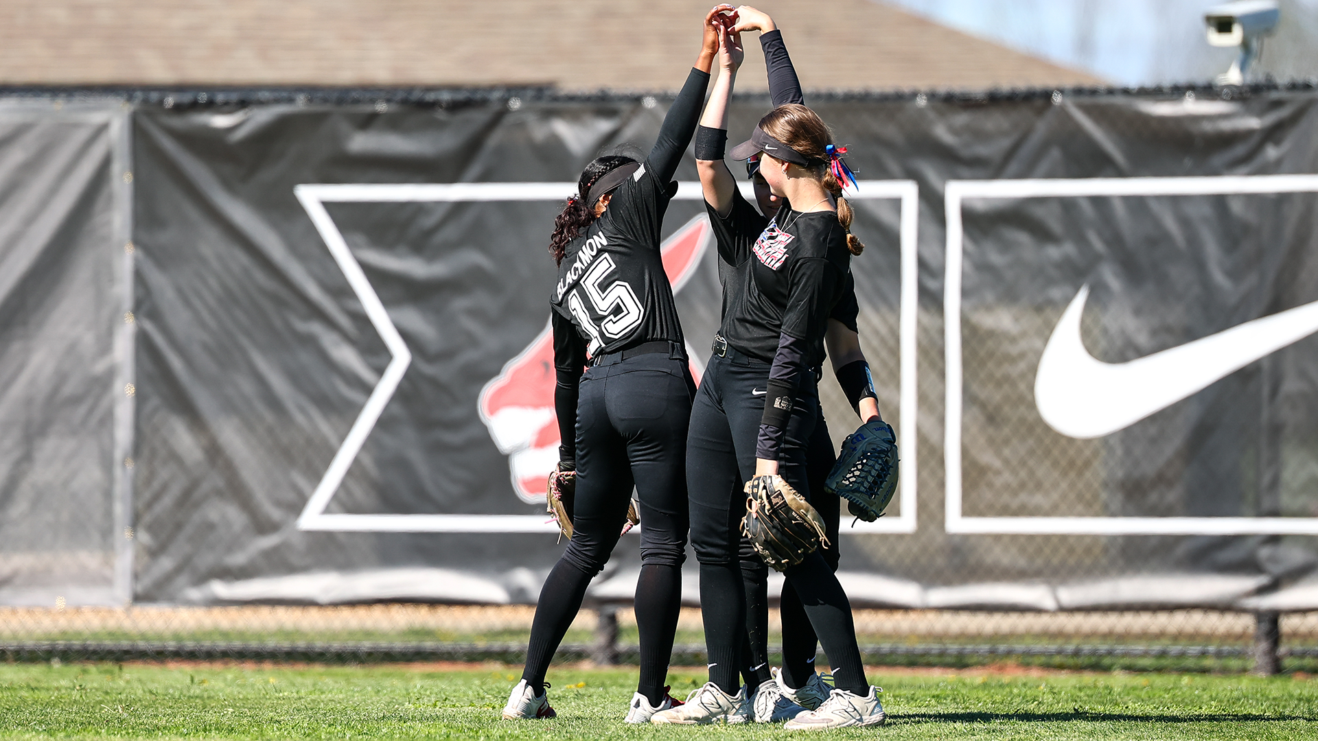 Jennies Softball Outfield Celebration vs Rogers State