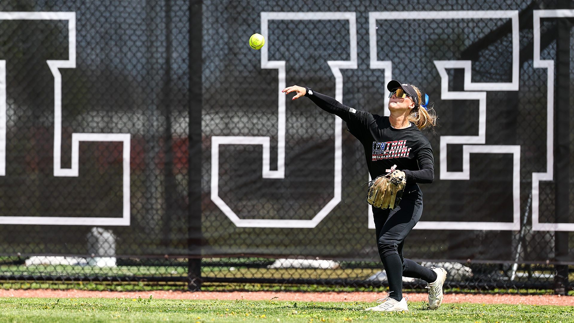 Taylor Kvale throwing ball from outfield 
