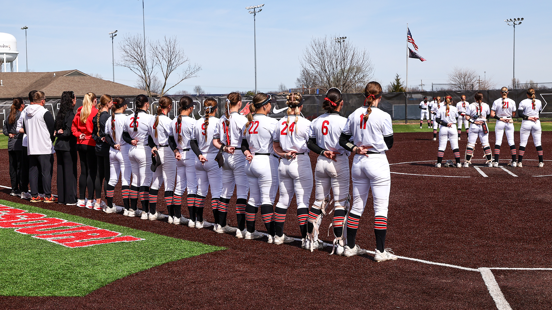 Jennies Softball National Anthem on field 
