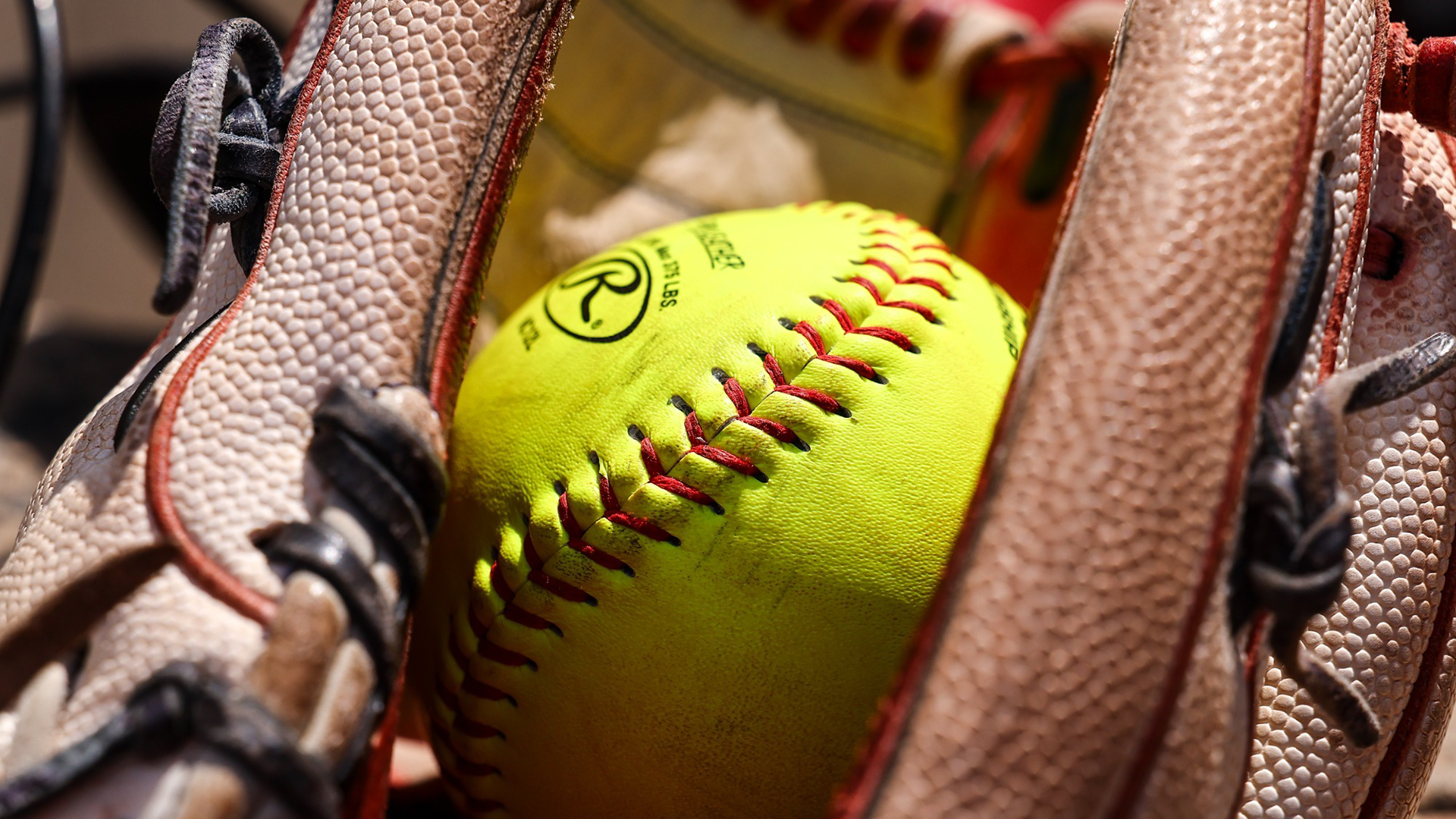 Softball in Glove