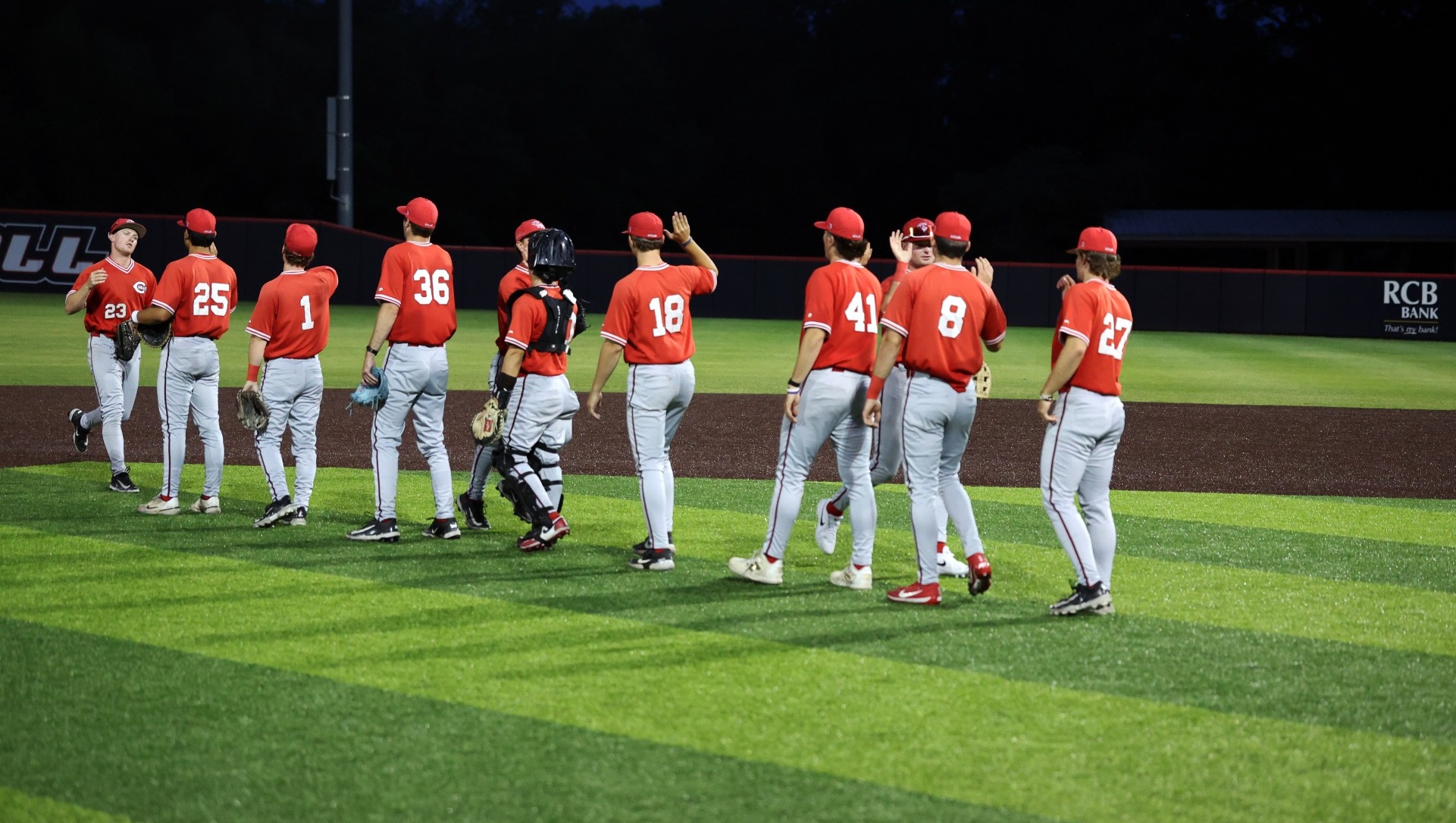 Mules Baseball postgame high fives vs. Rogers State in NCAA-II Central Regional May 15 in Claremore, Oklahoma