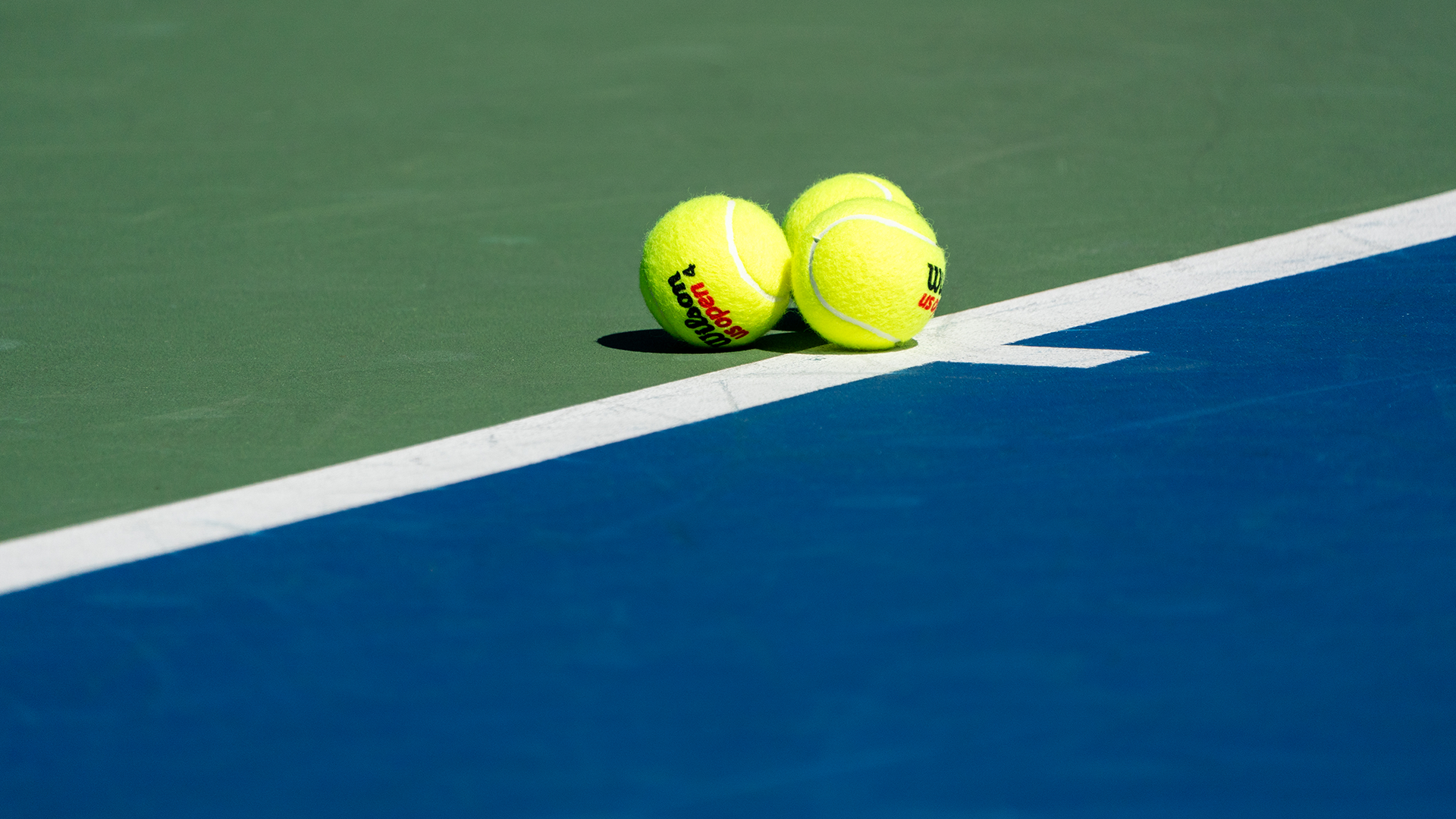 Tennis balls on court