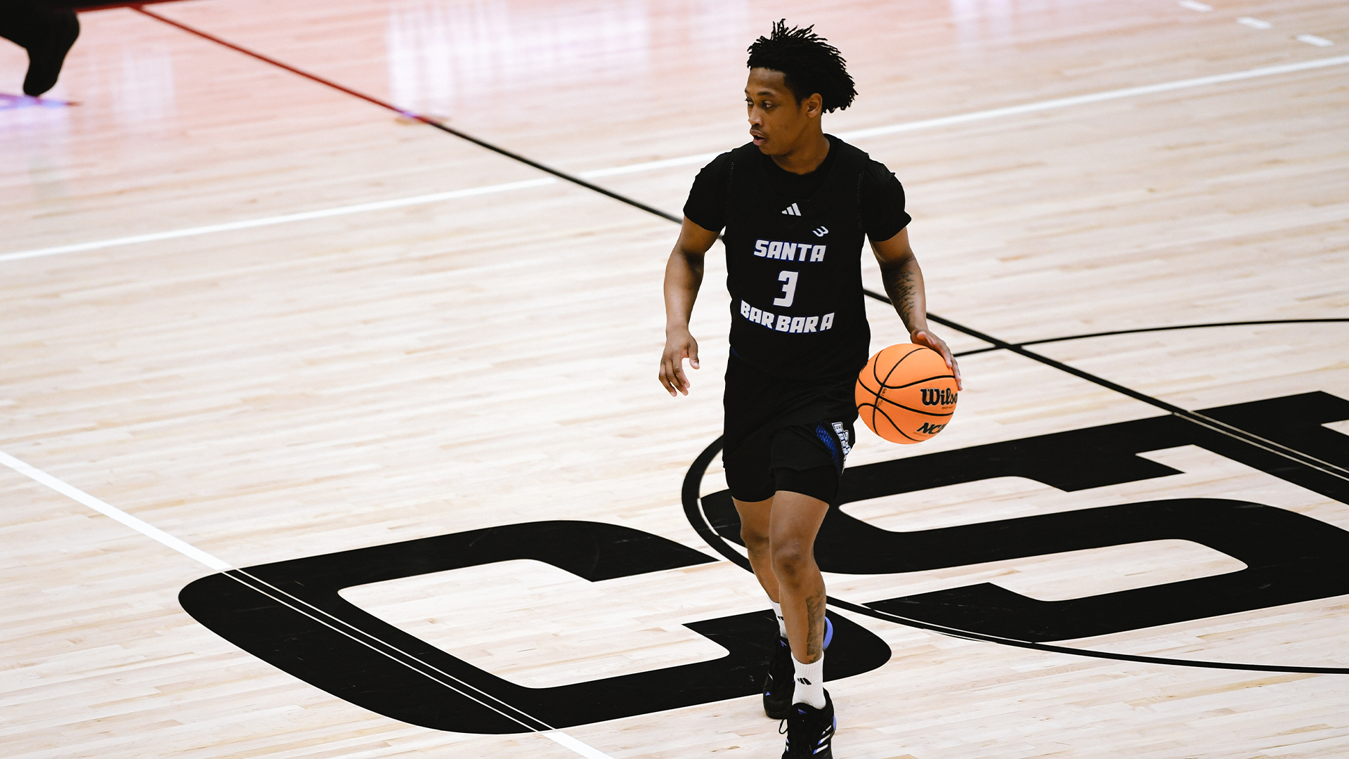 cj dribbling at csun