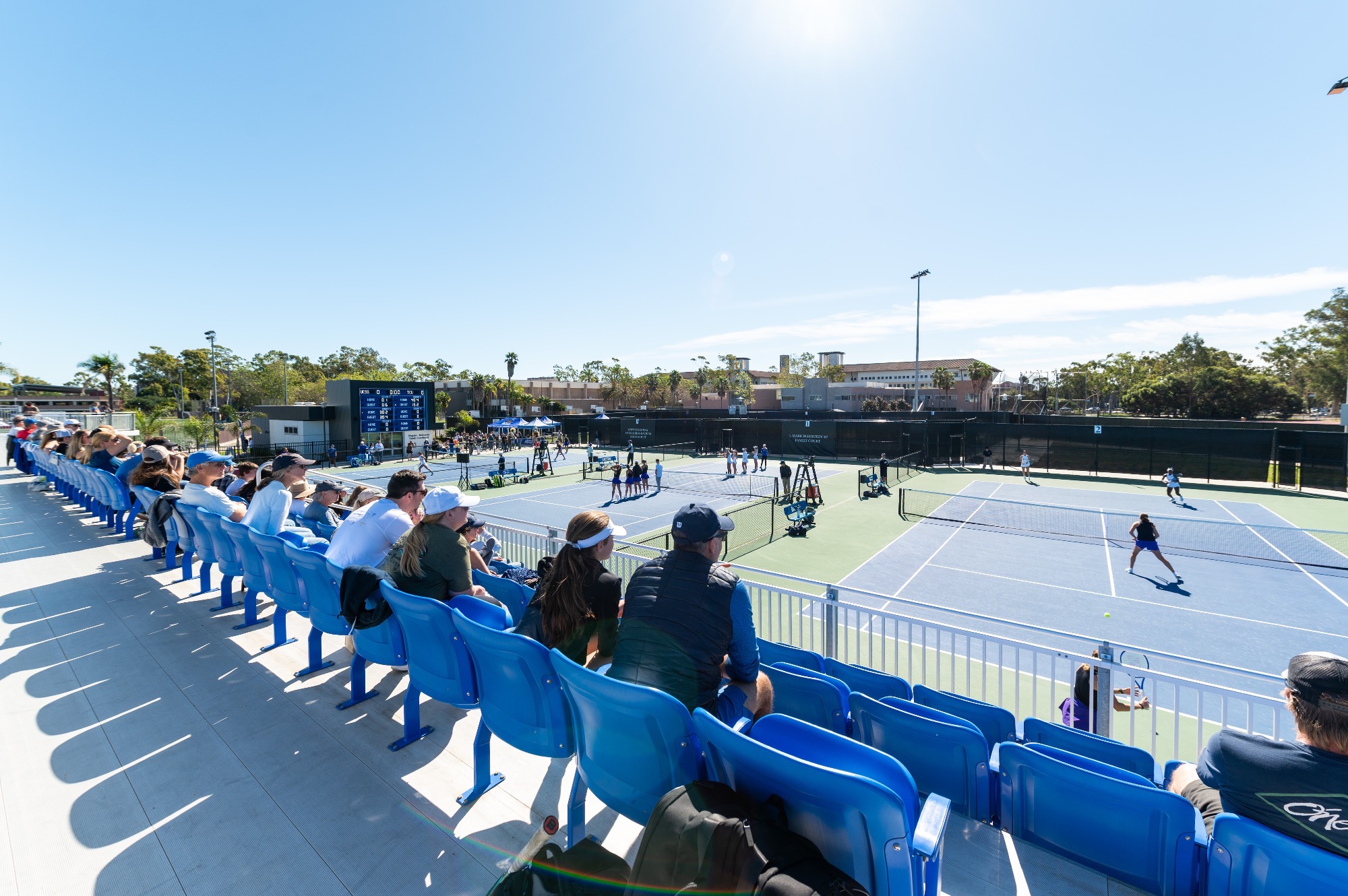 Gaucho fans in the stands overlook the Women's Tennis team as they take on TCU at the Arnhold Tennis Center.