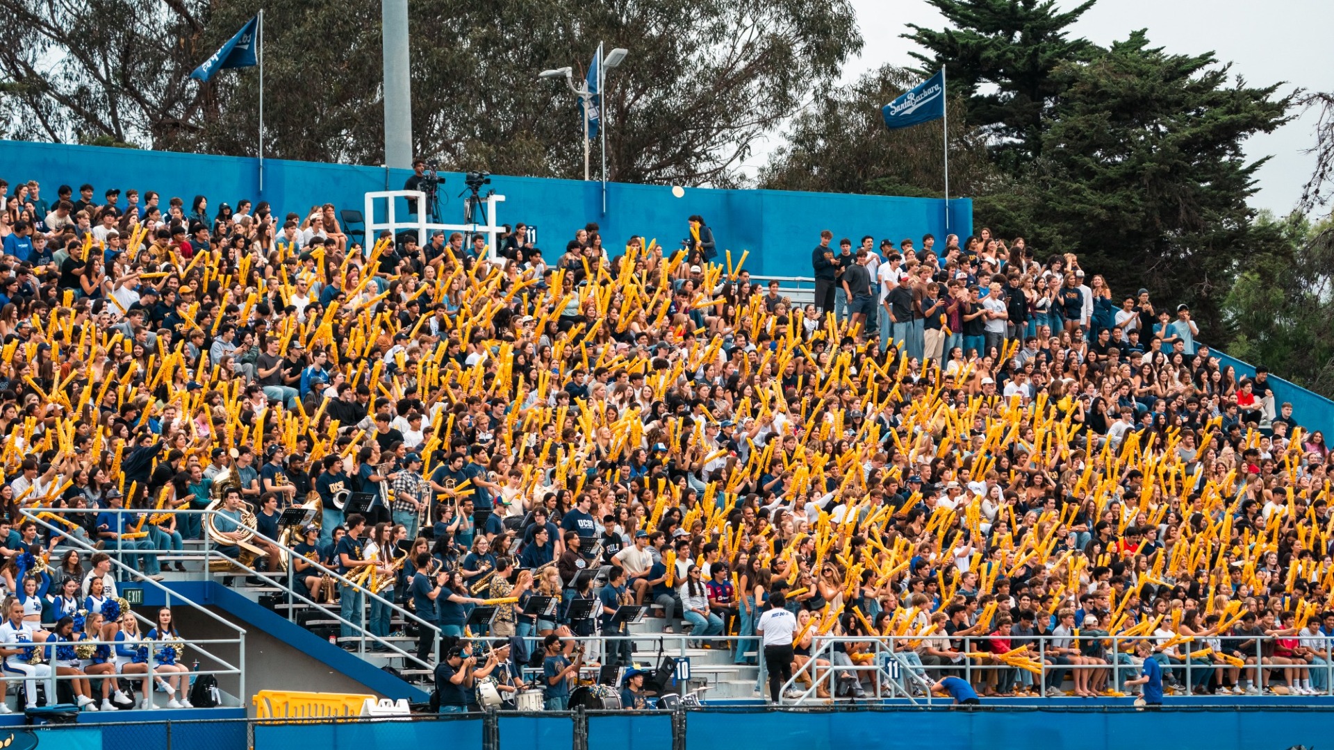 A photo of the student section at Harder Stadium, awash with yellow inflatable 