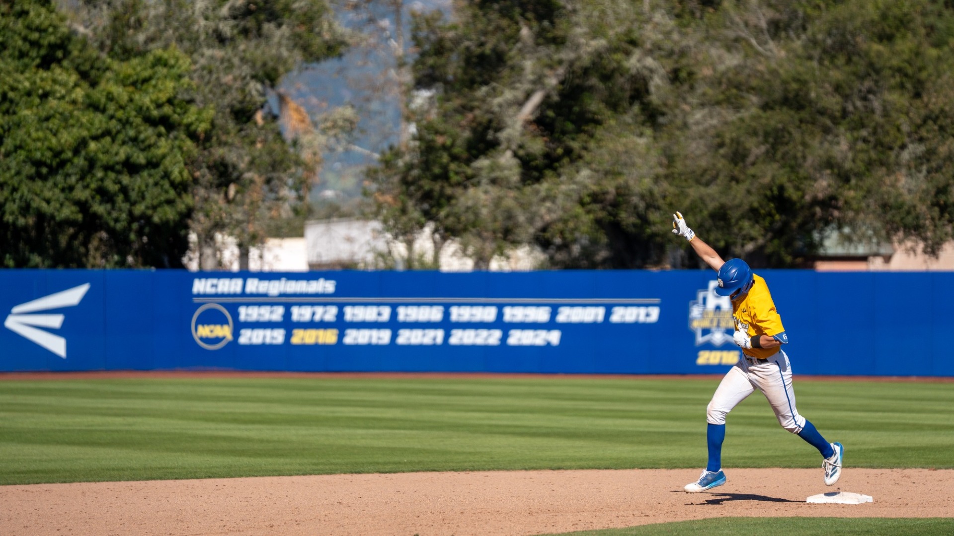 Nick Husovsky rounding the bases at Caesar