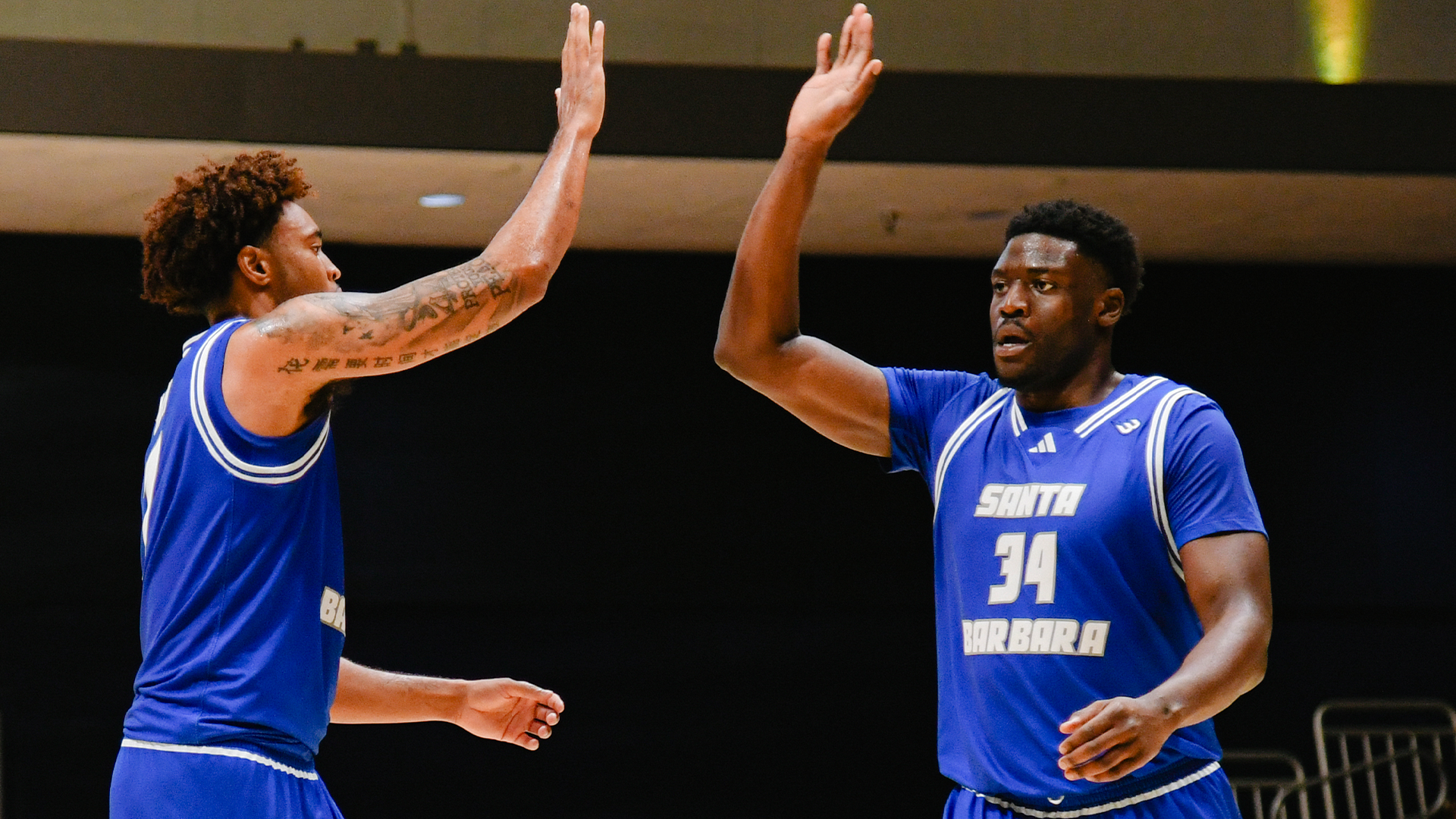 hosana and colin high five