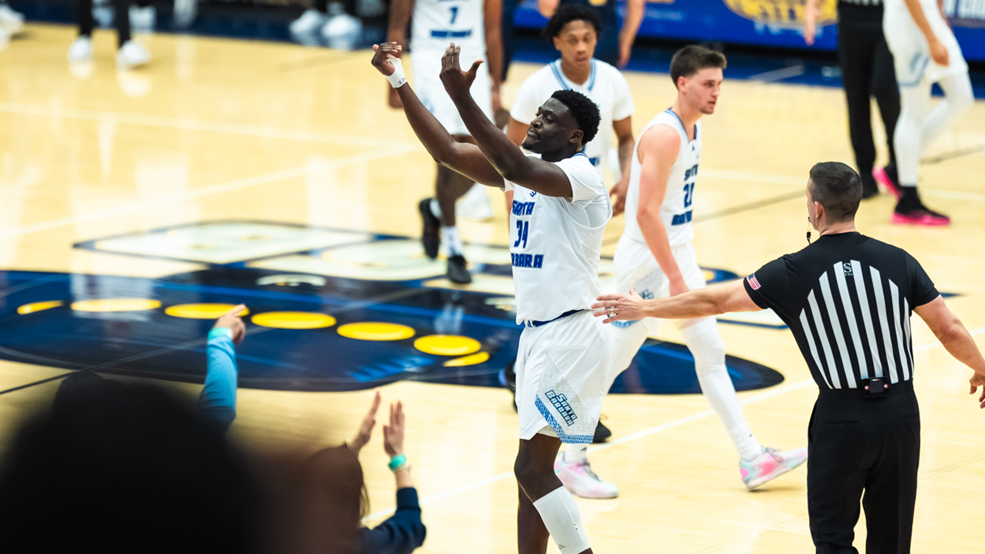 hosana celebrating with crowd