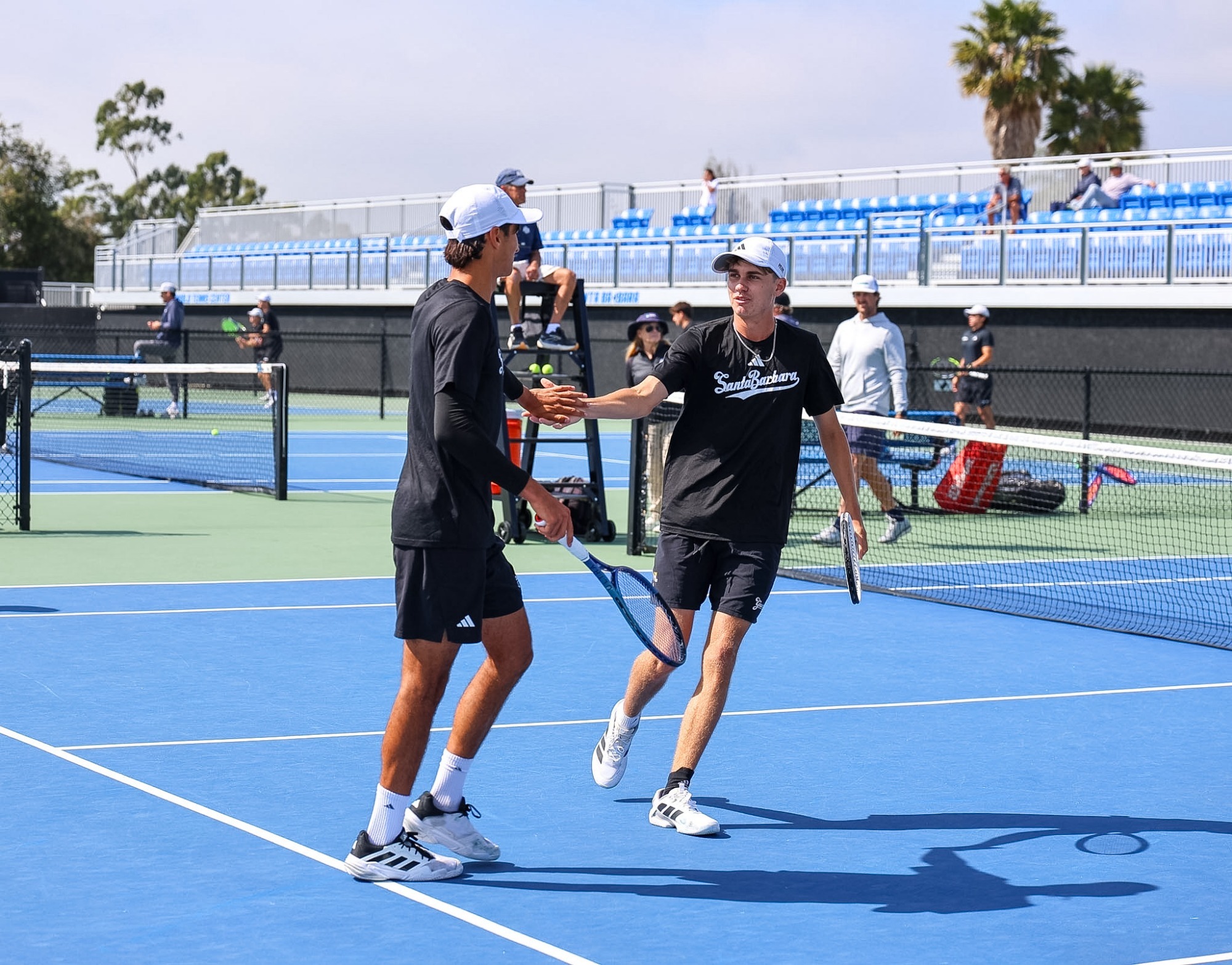 Lorenzo Brunkow and Diogo Morais celebrating a point