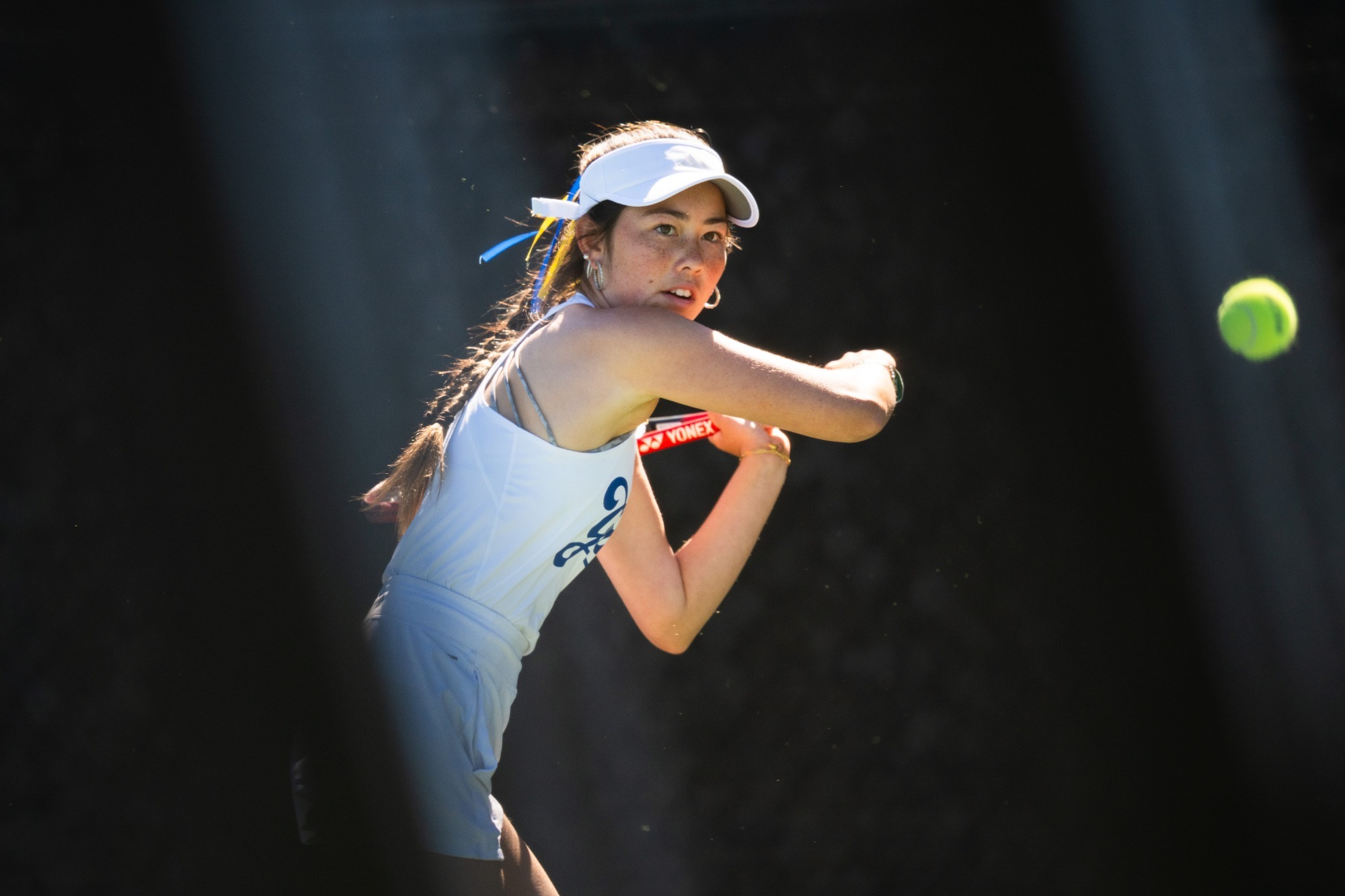 My-Anh goes for a backhand slice vs TCU