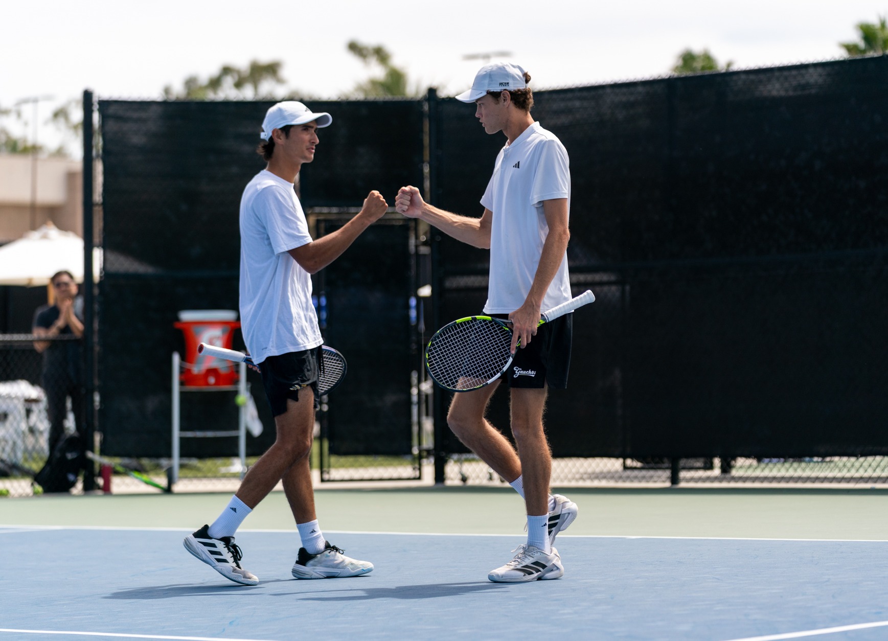 Diogo Morais and Dominique Rolland celebrate point vs UCSD