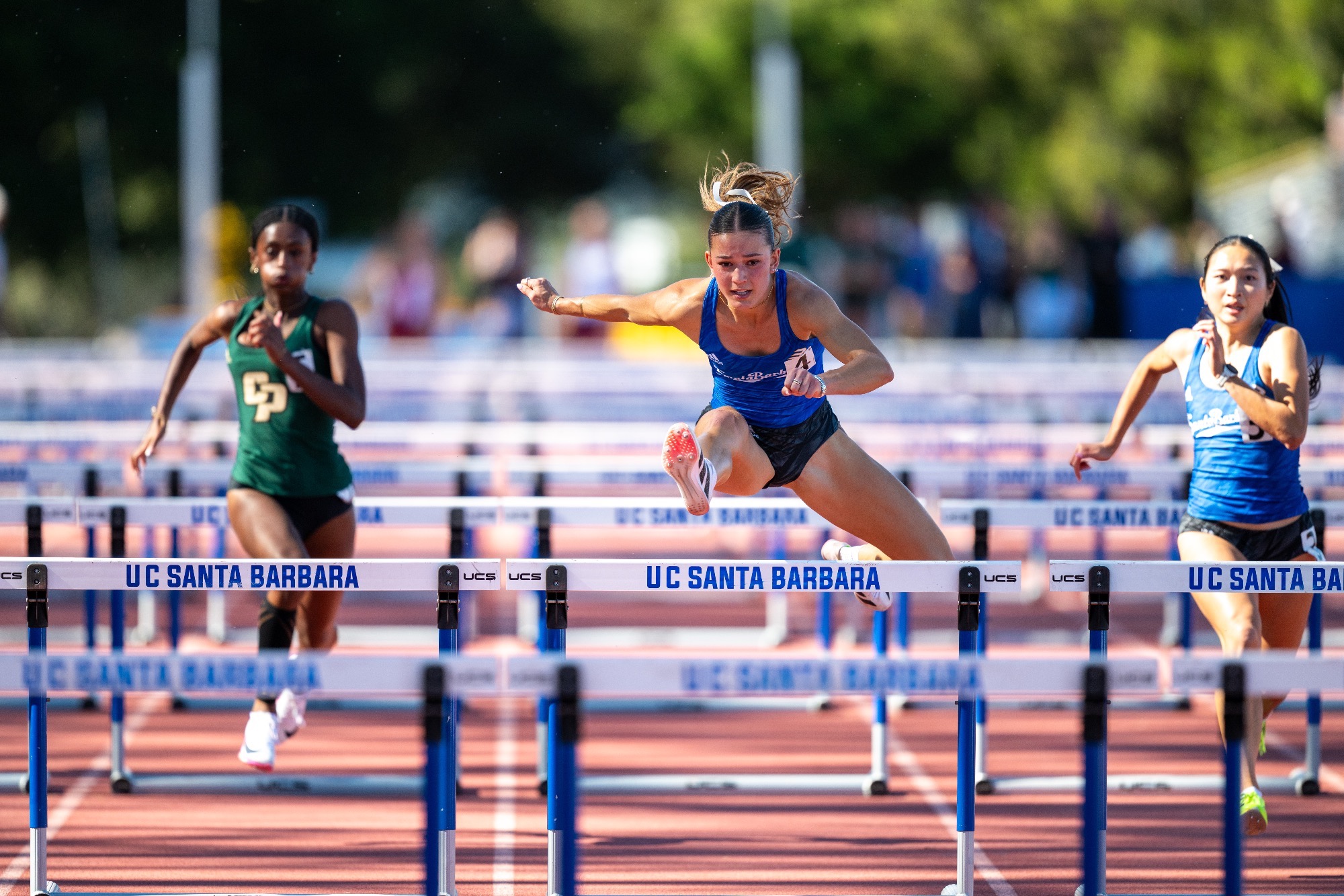 Maddie Conte hurdling 