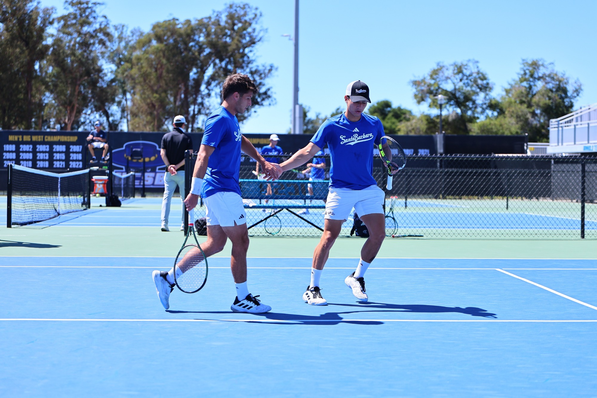 Lucca Liu and Miguel Avendano celebrate a point