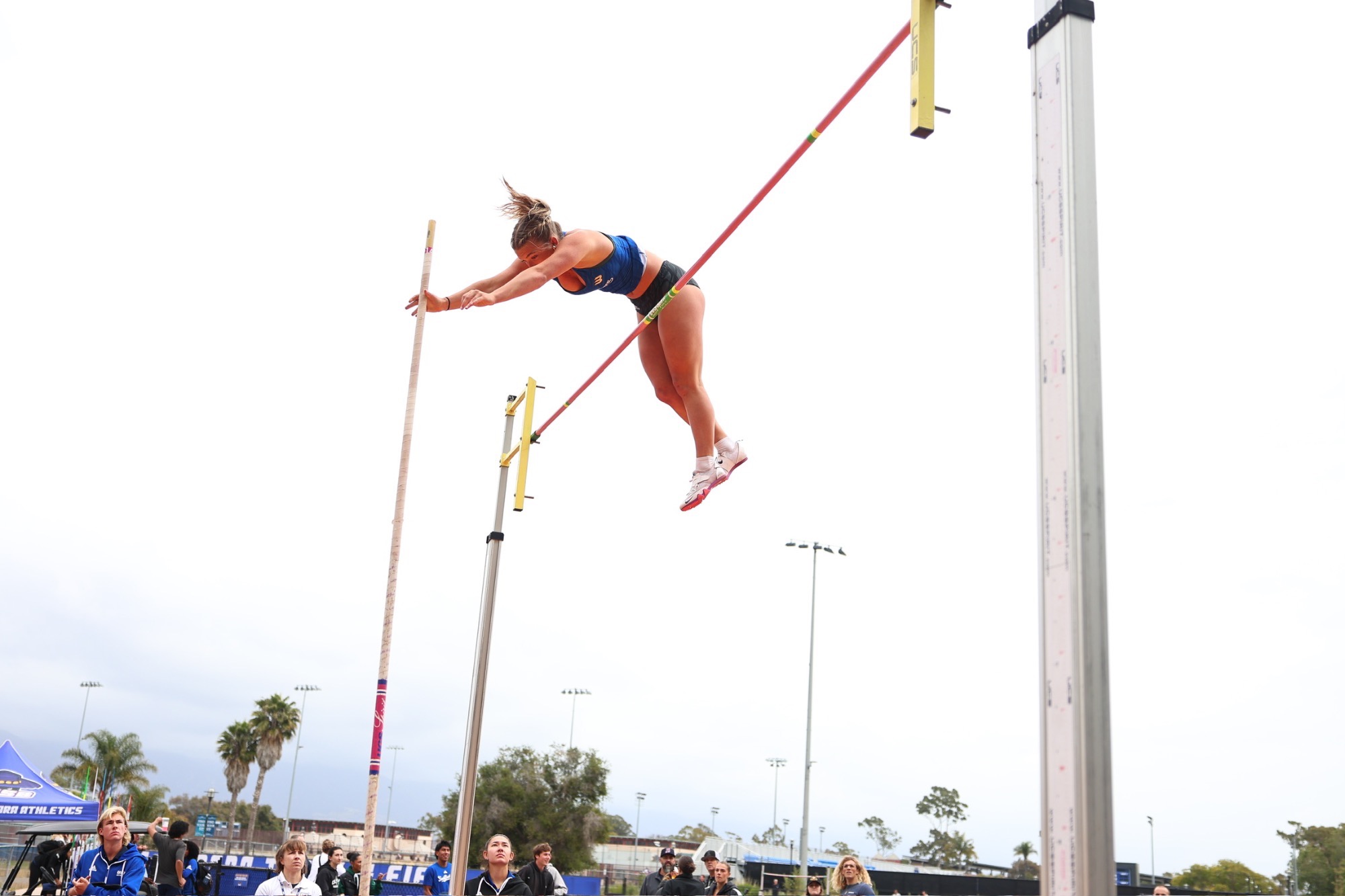 Sydni Harden competing in pole vault