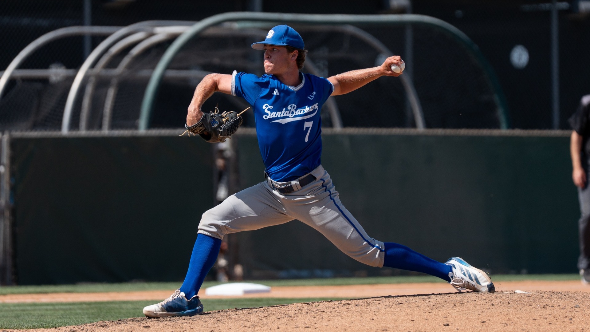 #7 Cole Tryba lunges into his pitch delivery from the mound at UC Irvine's Anteater Ballpark. 