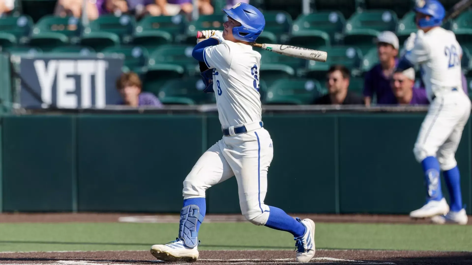 Rowan Kelly follows through a swing in the first game of the 2026 Austin Regional