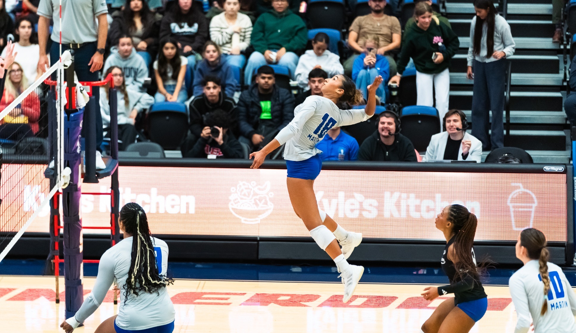Gabi Martinez jumps for a hit