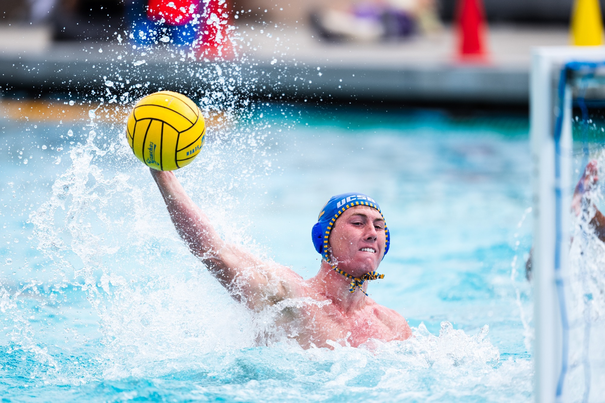 #22 Hayden Tully grimaces with effort as he starts to let loose a shot