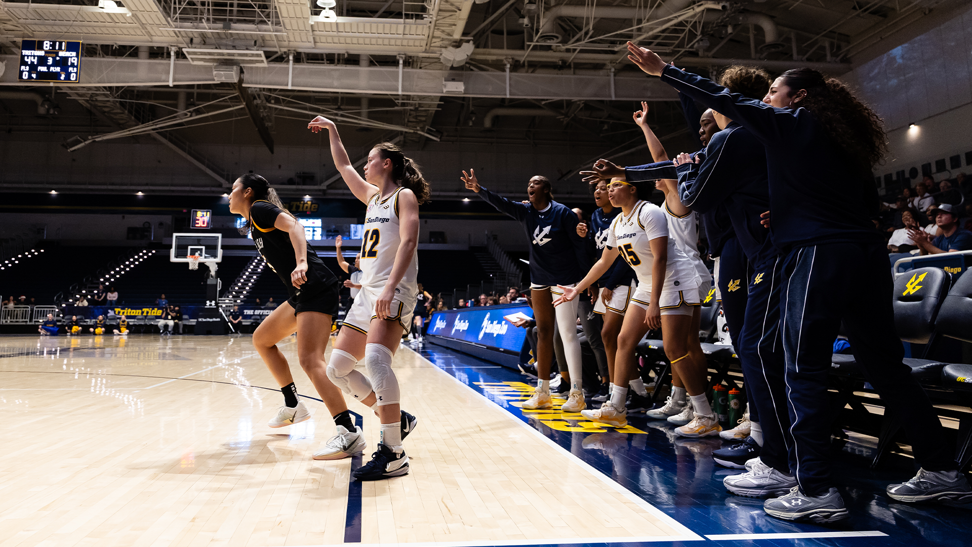 Rosa Smith with Bench Celebration vs LBSU