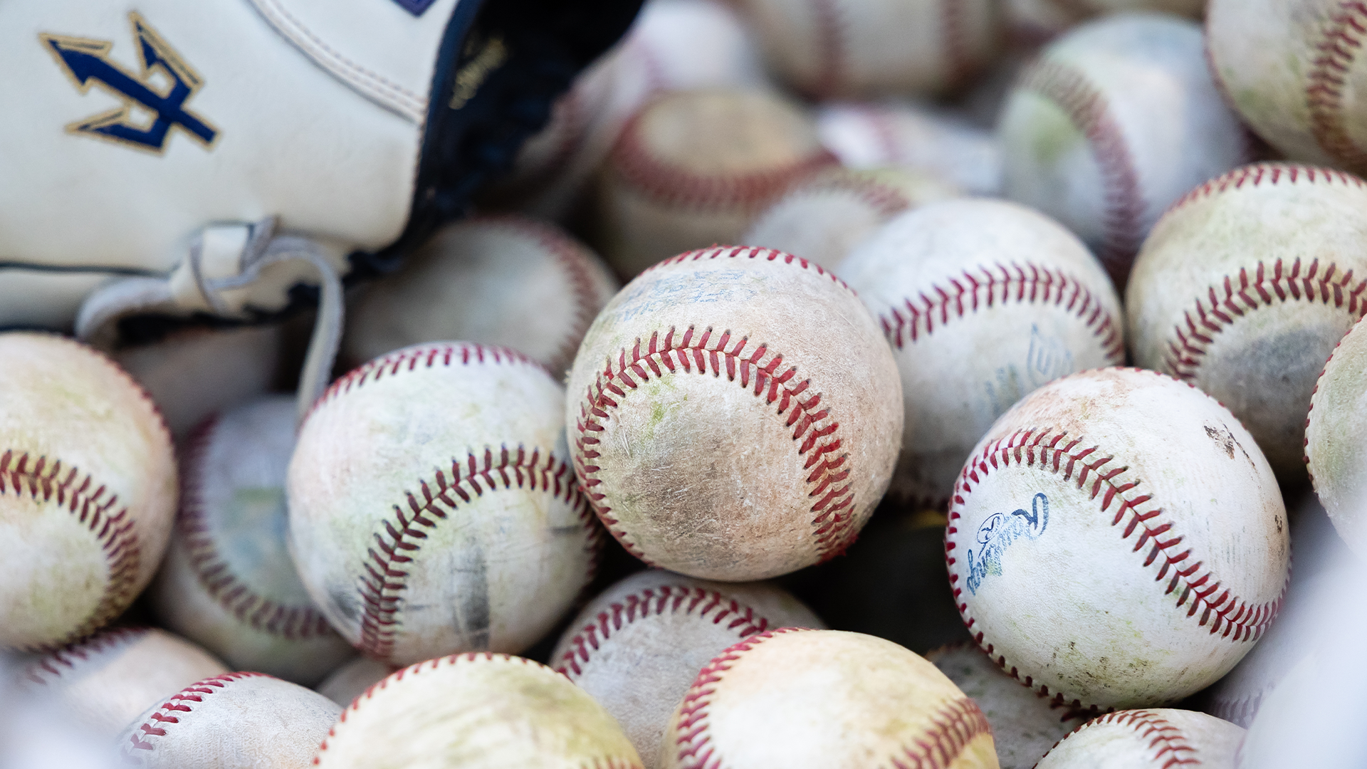 Baseballs with Trident logo