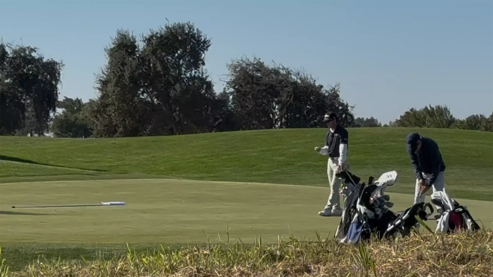Ethan Lien lines up, and drains, a birdie putt during round 2 in Stockton