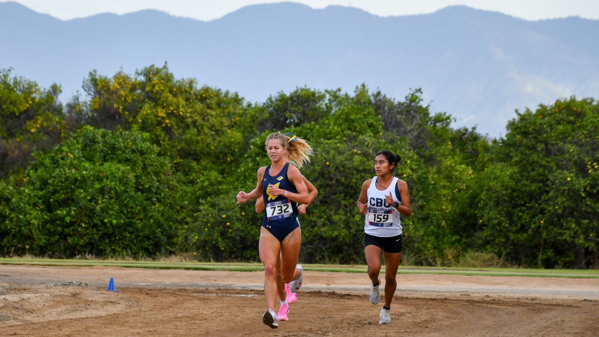 Elle Marsyla racing on a dirt course