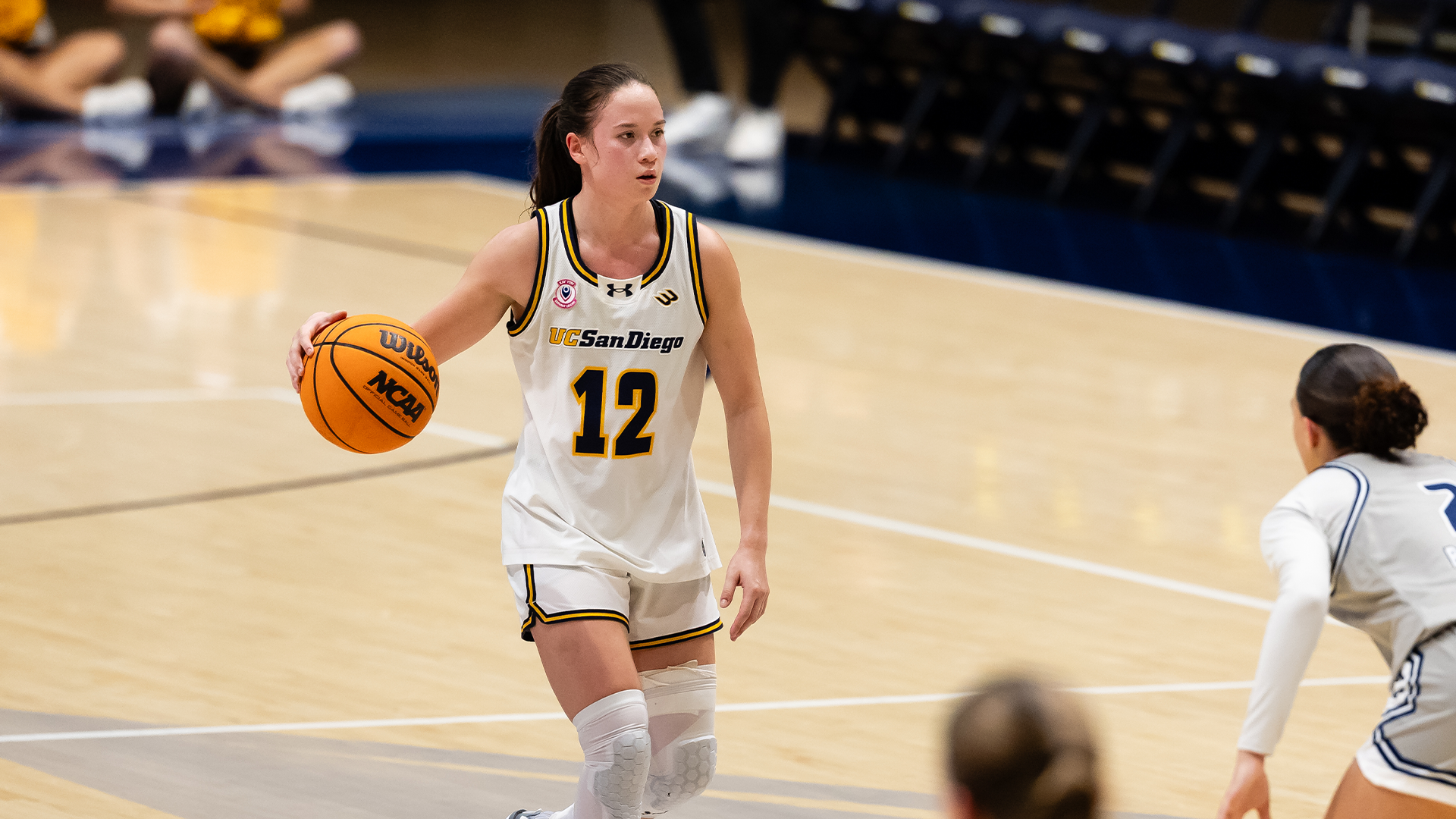 Rosa Smith dribbles up center court